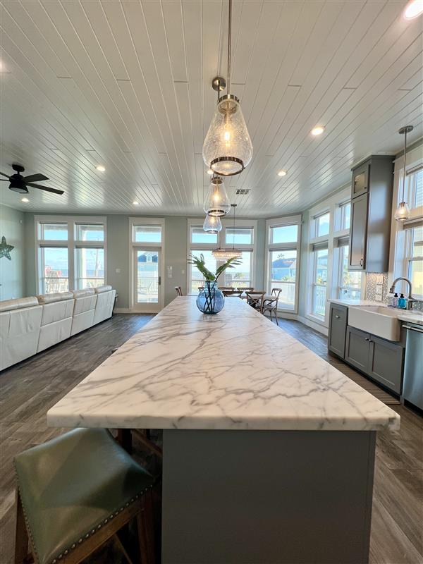 Crystal Paradise Kitchen: Bright, open kitchen featuring luxurious marble surfaces and generous space for gatherings.