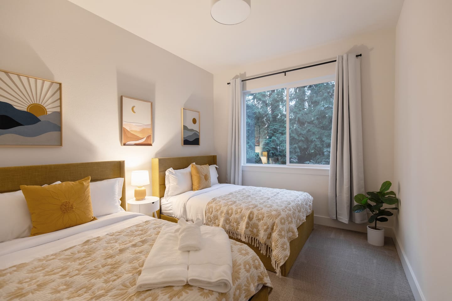 This is one of the three bedrooms downstairs, featuring two full-sized firm beds. We designed this room with kids in mind, so we chose slightly firmer mattresses.






