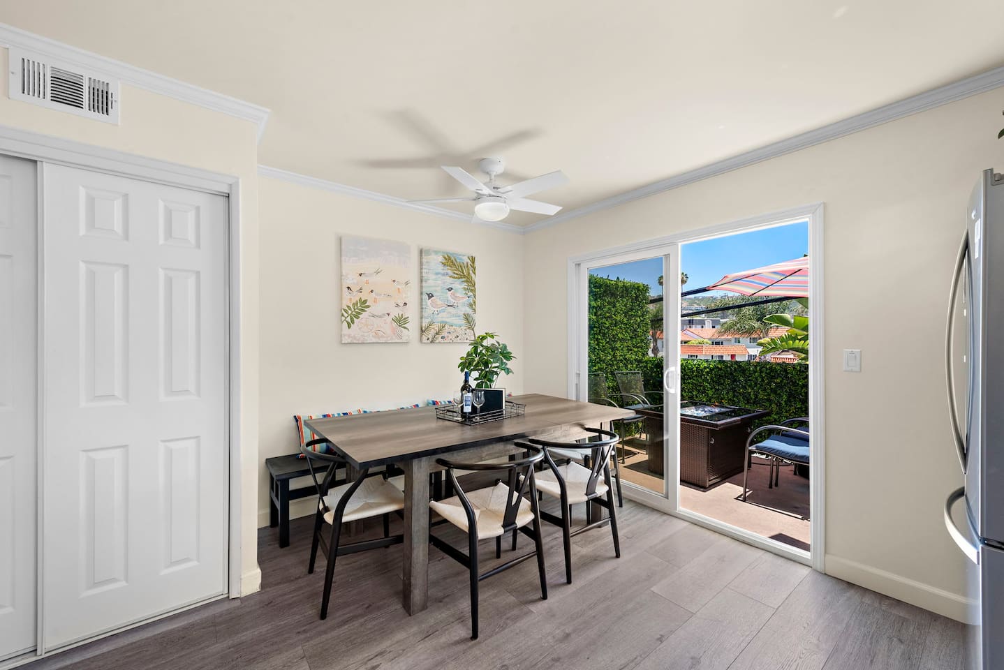 Table seats 6 comfortably and outside patio is just off the kitchen if you prefer to eat outside.