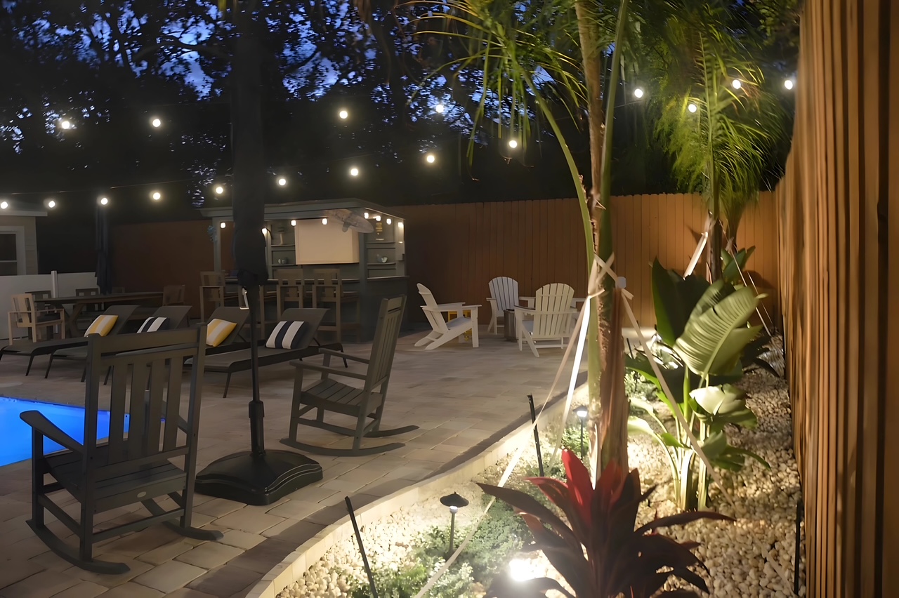 Upgraded landscaping providing a tropical theme