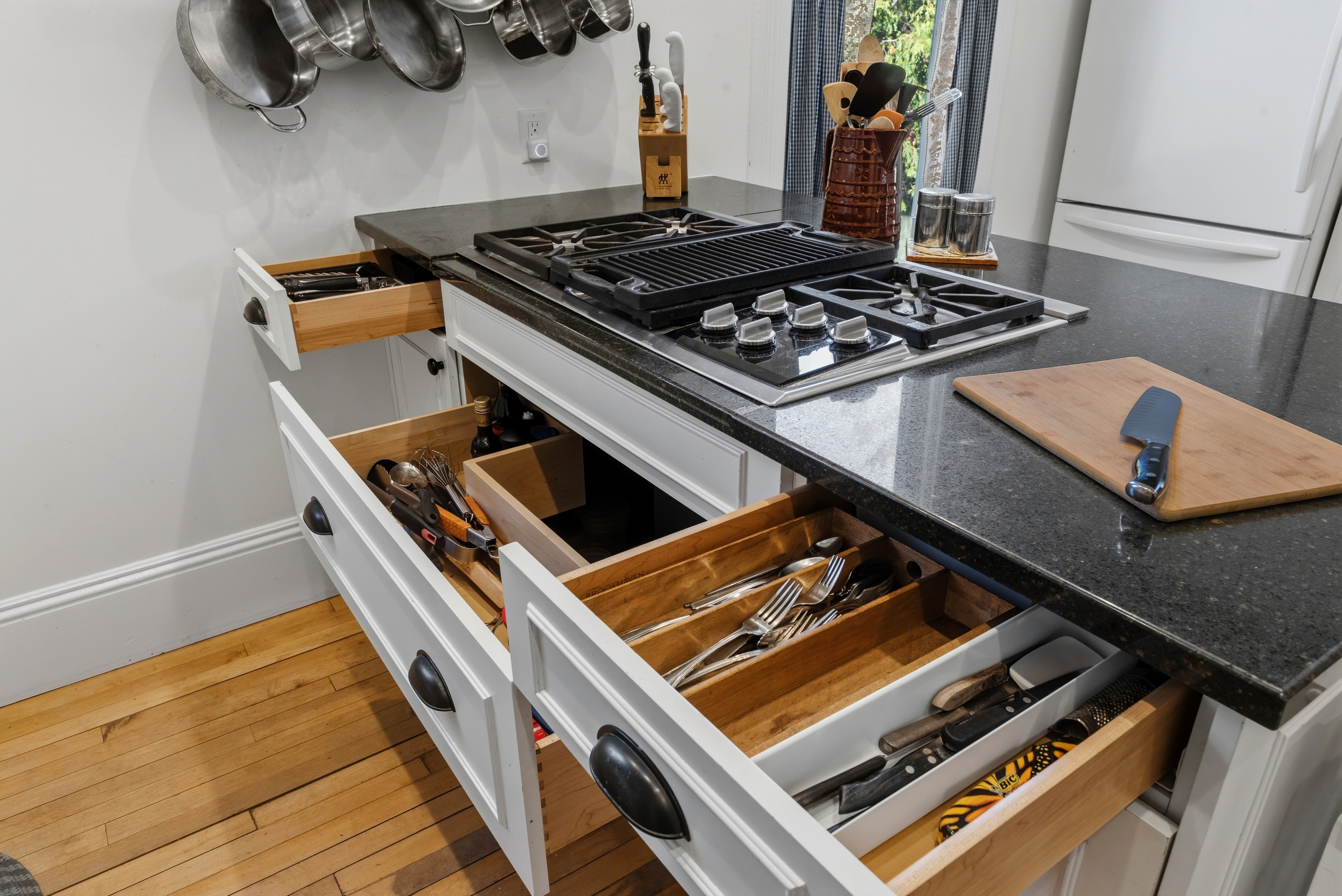 Kitchen drawer organized w/ cooking tools for easy use