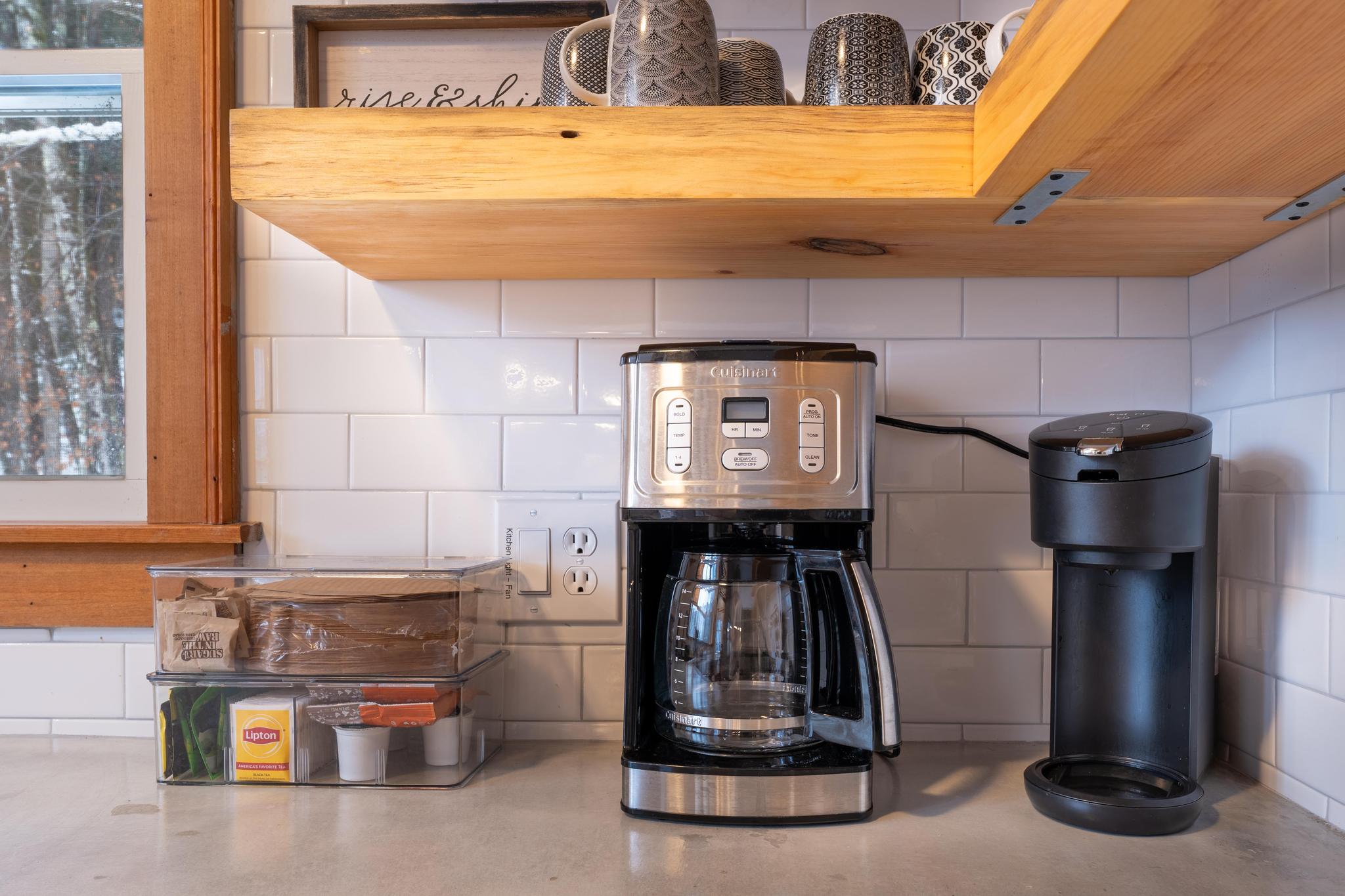 Coffee bar offers Keurig, french press, and drip.