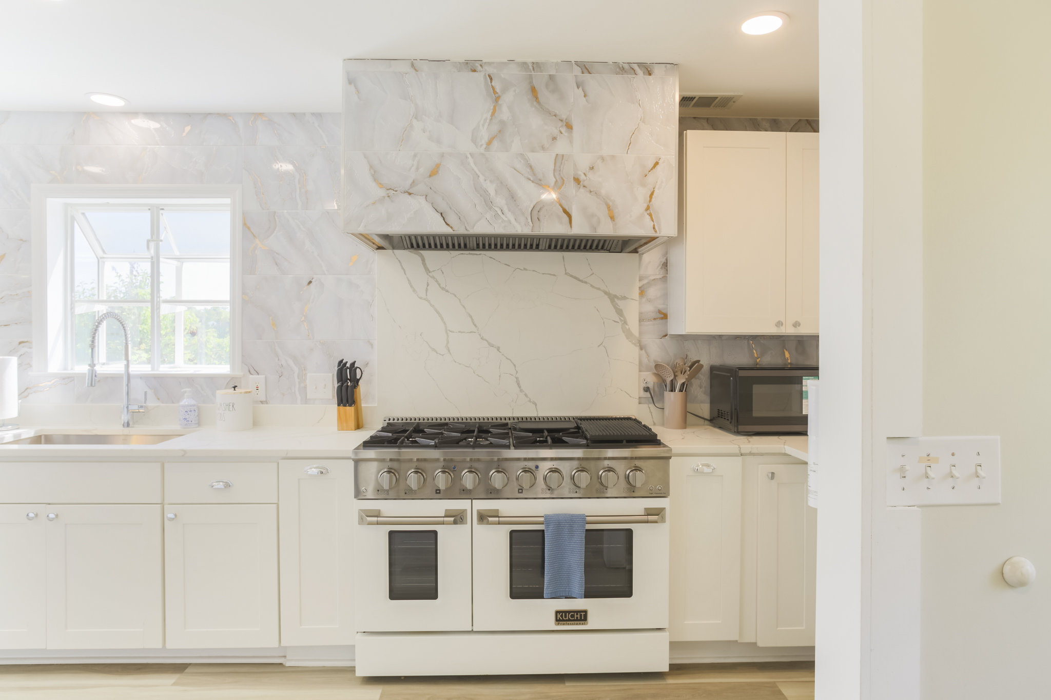 Cook like a pro on the 48” gas range with dual ovens — perfect for family meals.