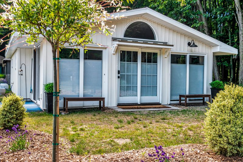 The floor to ceiling glass doors! All windows have adjustable cellular shades