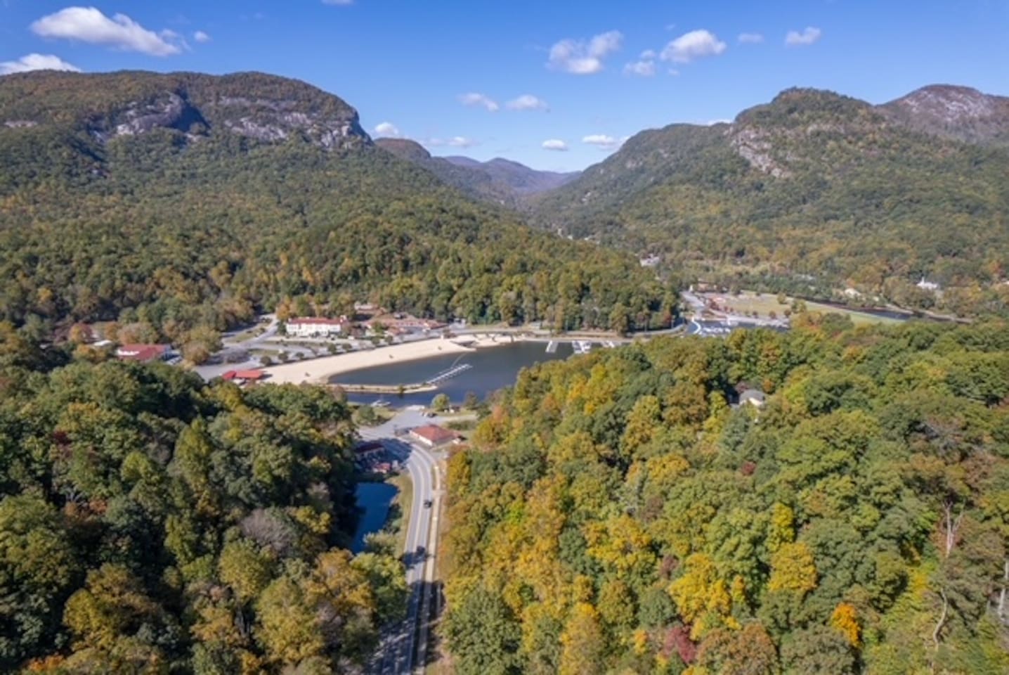 Drone footage/pictures of home and the surrounding area 
Pictured is Lake Lure Beach, Marina, Lake Lure Inn and Spa!