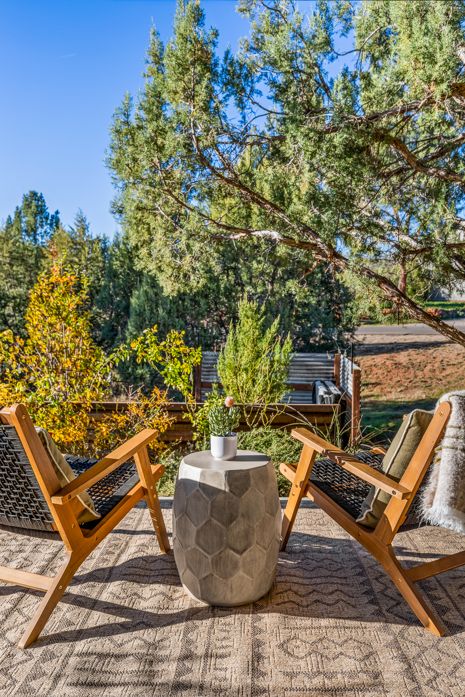 Thoughtfully styled outdoor seating area for two, designed for relaxing and enjoying the Sedona atmosphere.