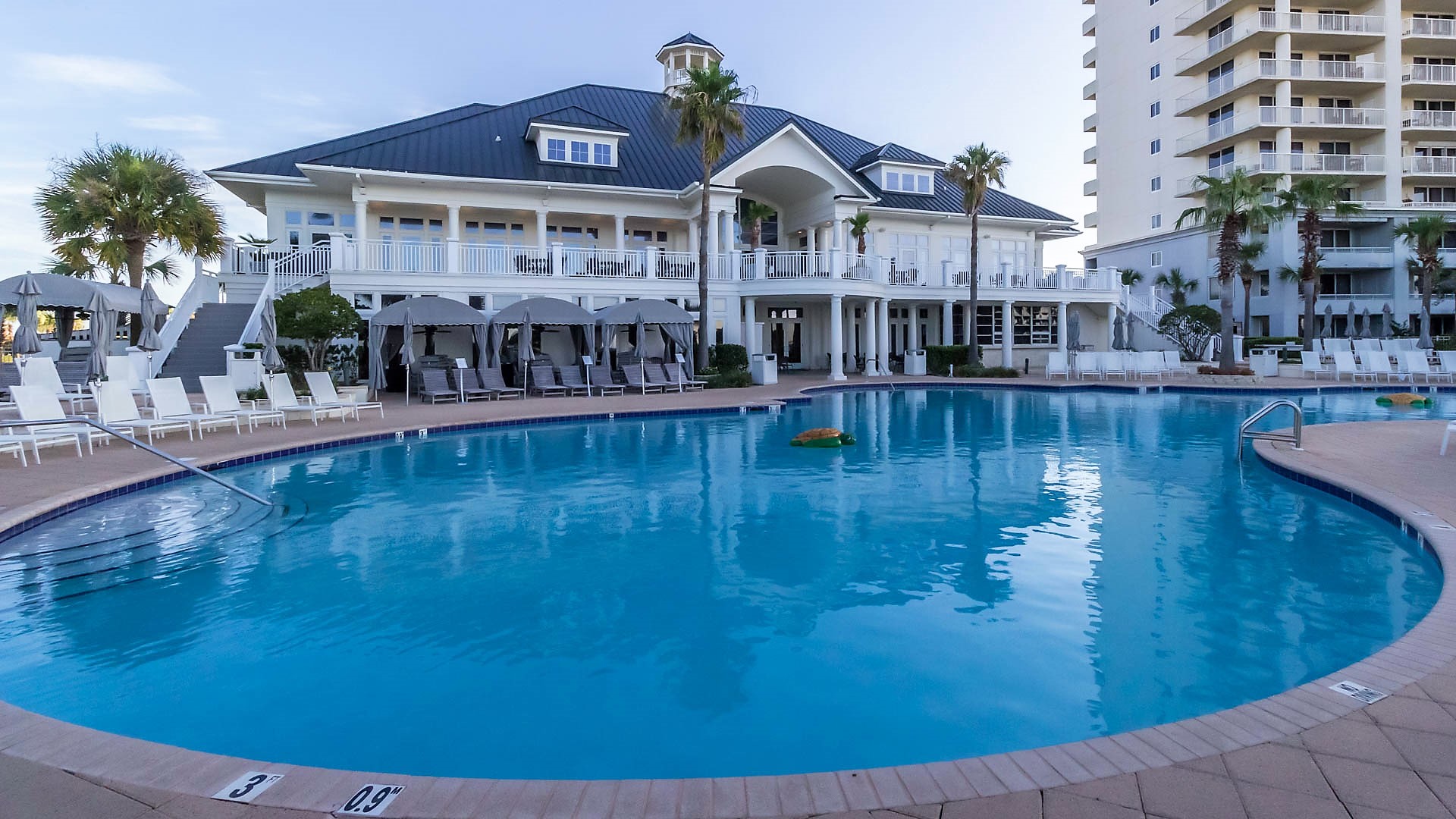 Discover the elegant centerpiece of our community. The Beach Clubhouse stands as a sophisticated coastal retreat, welcoming you to a world of exclusive amenities and unparalleled charm.