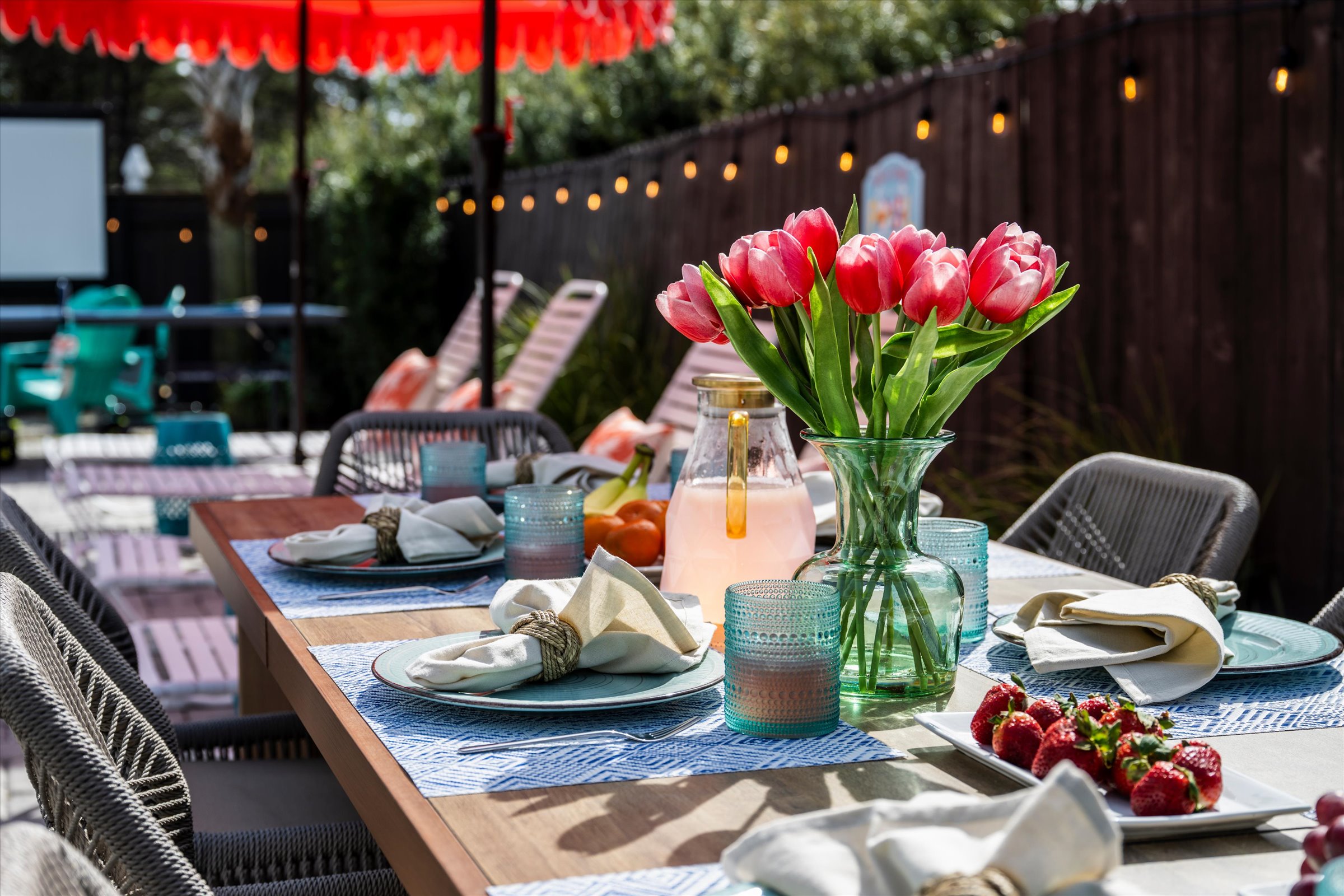Sunshine, fresh fruit, and poolside dining. Gather around the table for relaxed outdoor meals while the kids swim and the grill is heating up. Vacation living at its best in Miramar Beach.