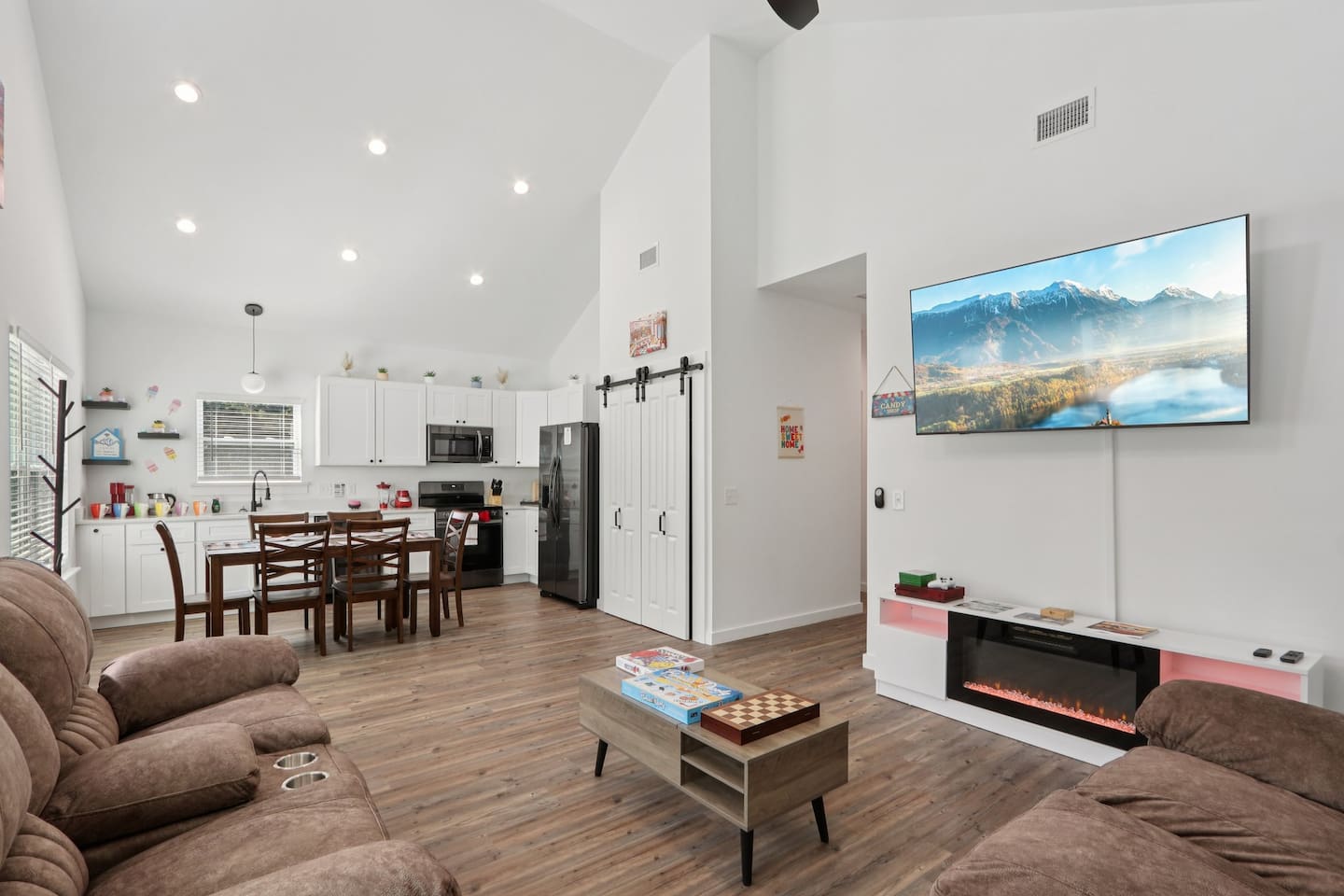 Reclining sofas, Smart TV, electric fireplace, games, lifting coffee table