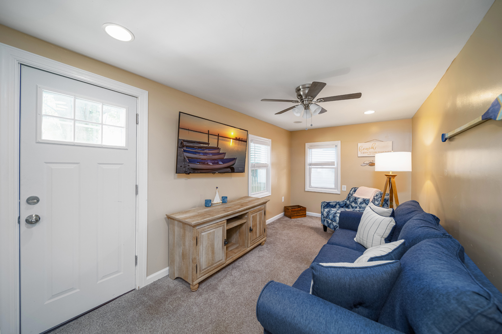 Cozy living area with a pull out couch, perfect for that extra guest or two.