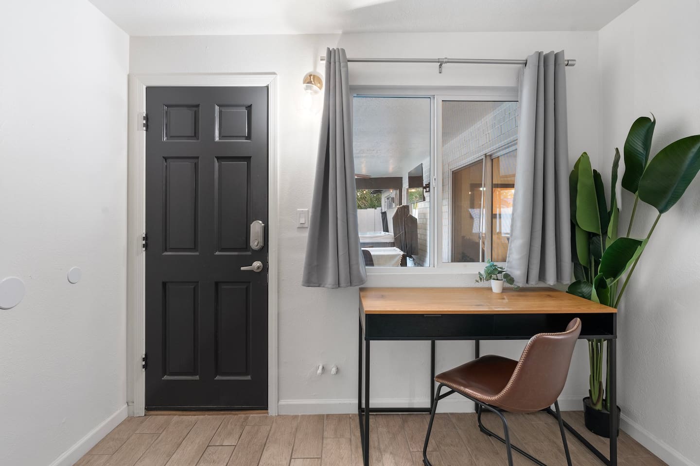 Stylish and functional workspace with natural light—perfect for remote work or planning your Scottsdale adventures.
