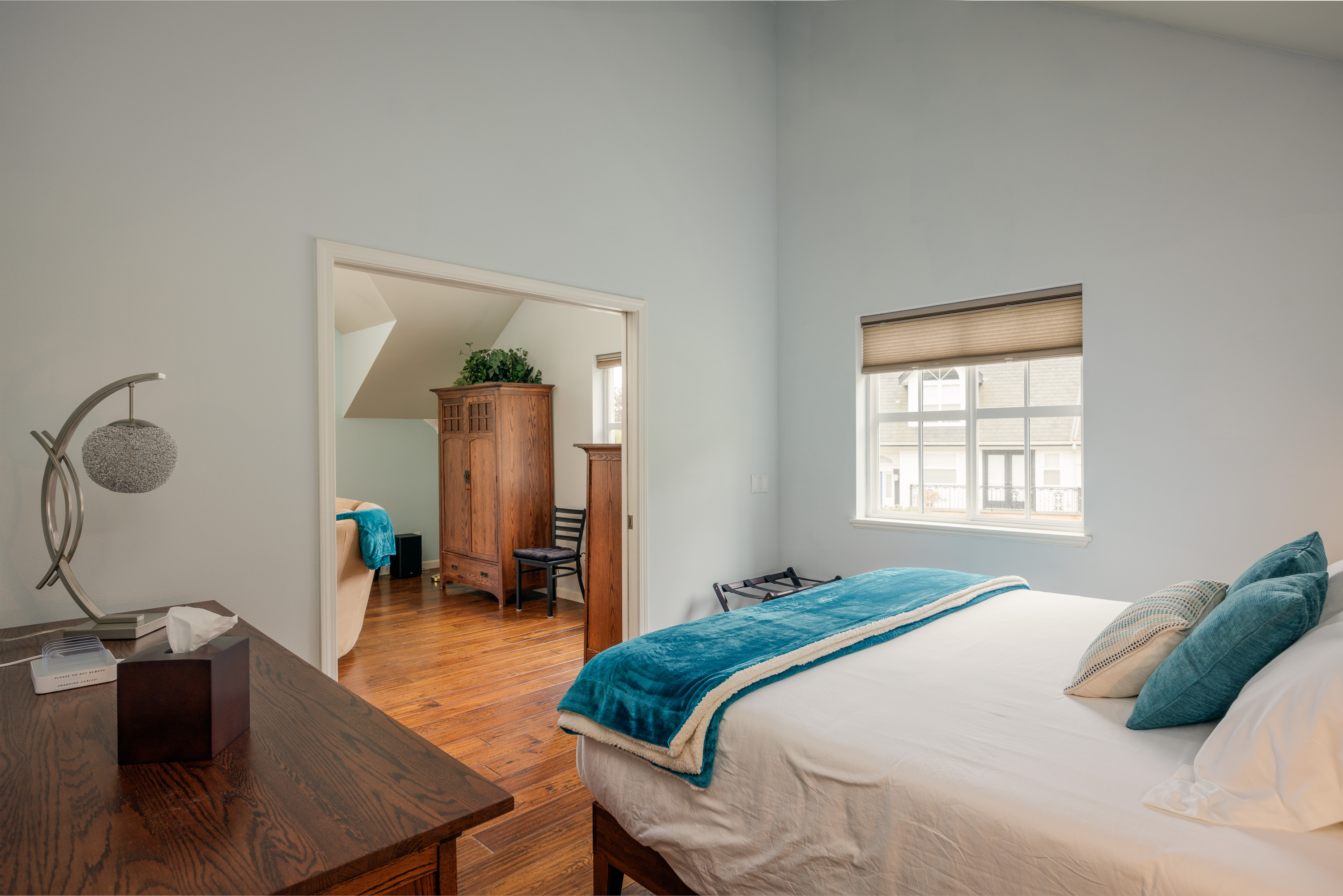 View of harbor through double doors to Master Bedroom