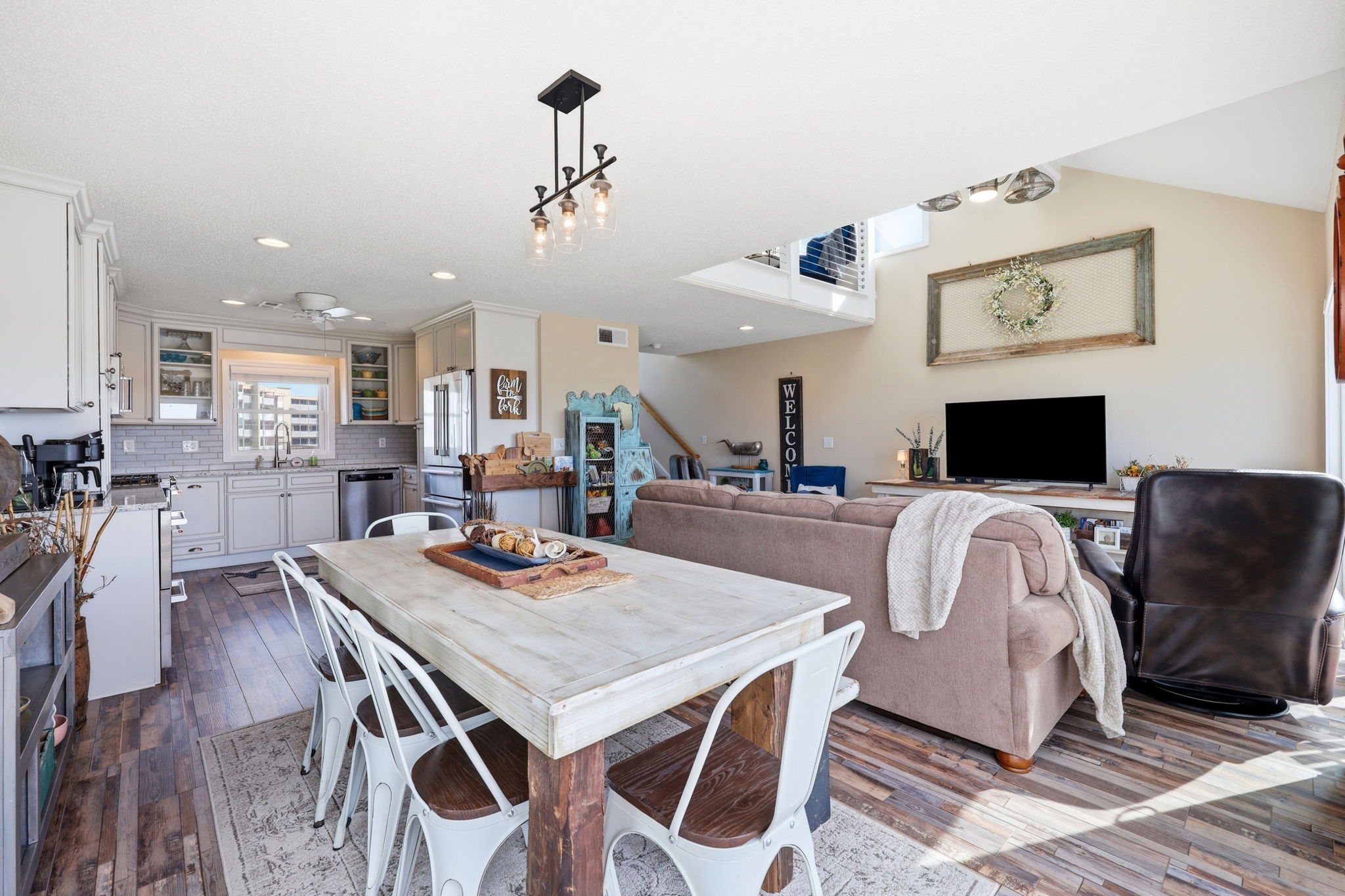Coastal charm meets rustic comfort in this inviting living space.