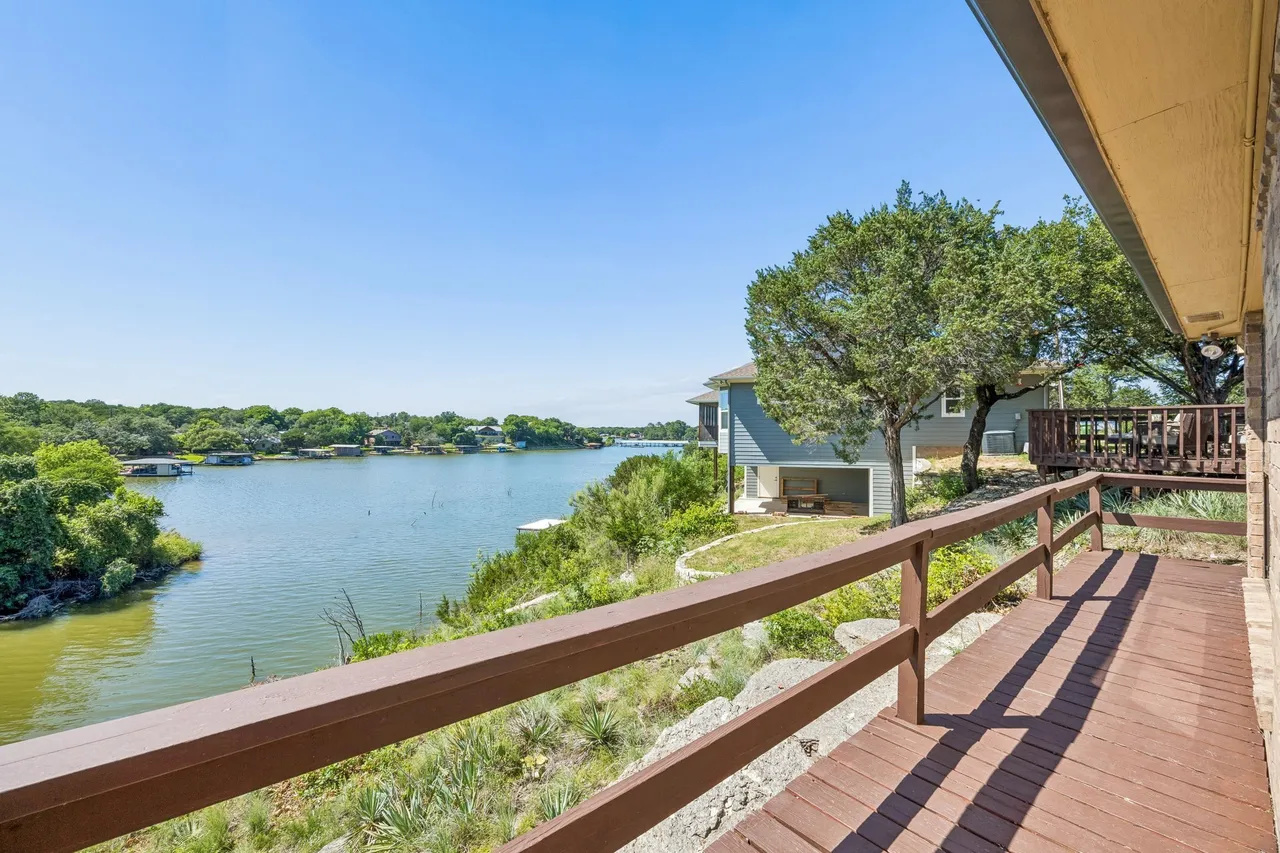 Elevated deck walkway with wide Lake Granbury views.