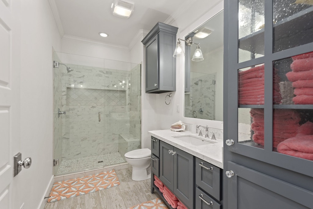 Shared full bath with a large walk-in shower.