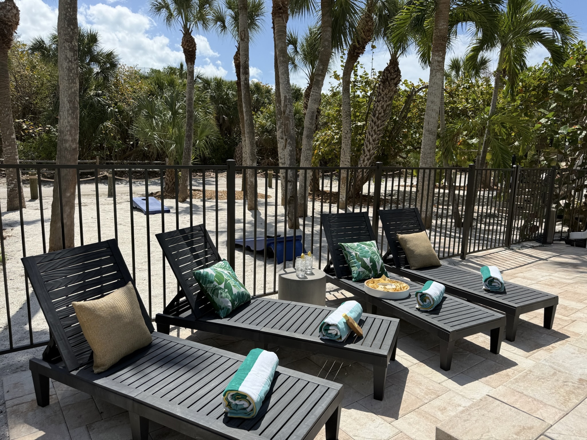 Soak up the warm Florida sun or dip your toes in the sand for a round of cornhole