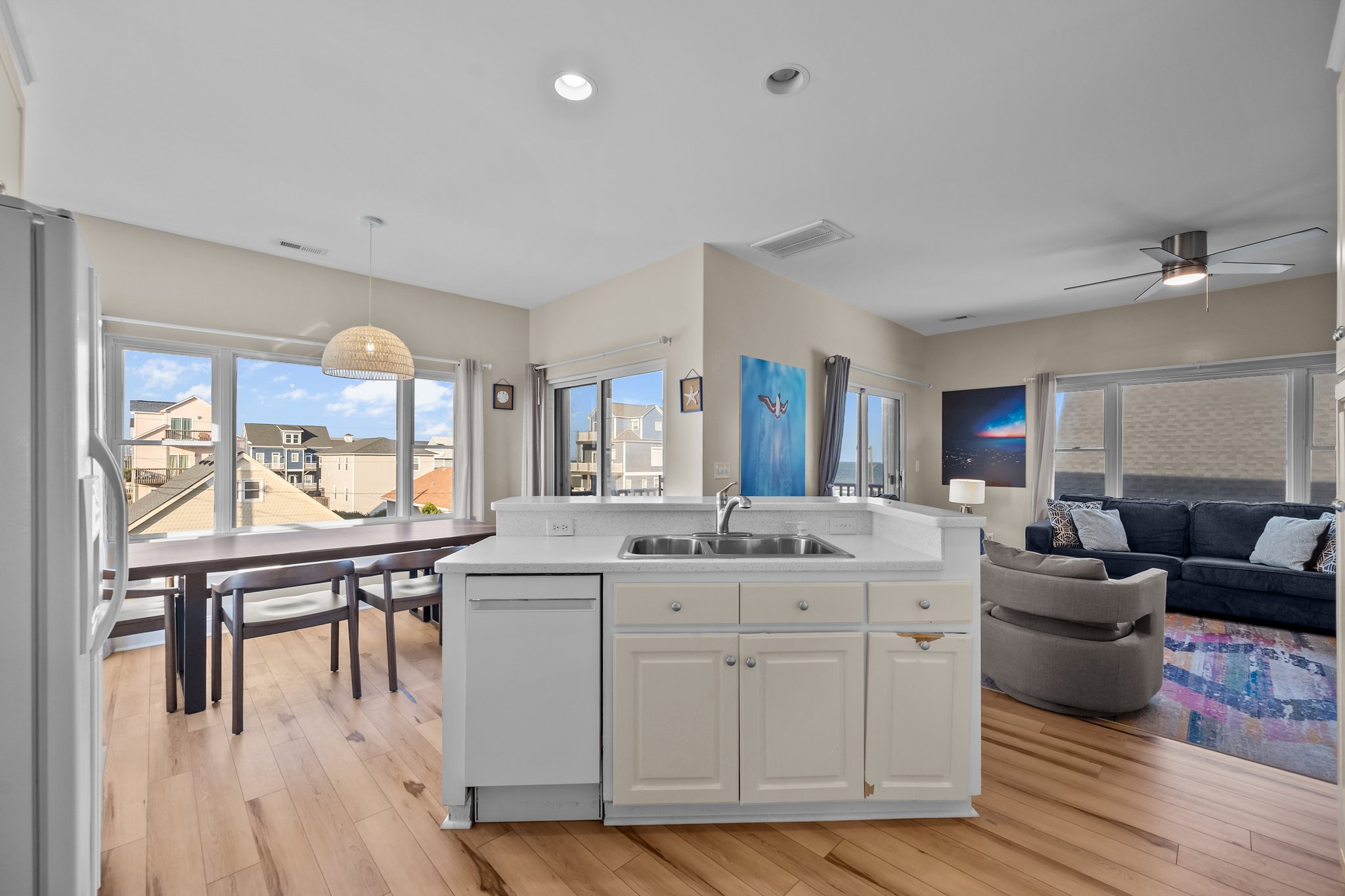 Spacious open-concept kitchen that flows seamlessly into the living and dining areas.
