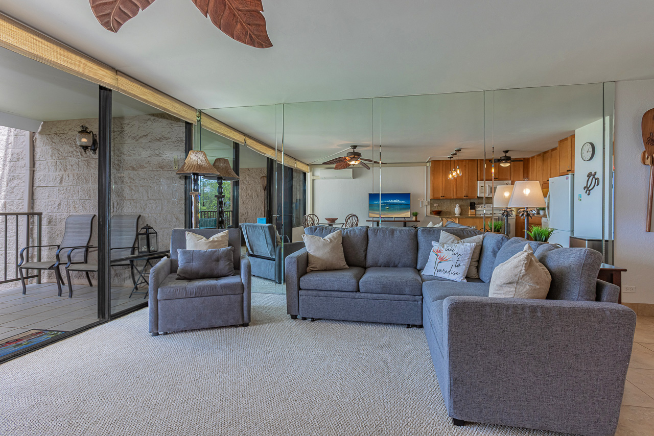 Spacious living room with brand new furniture and sofa bed