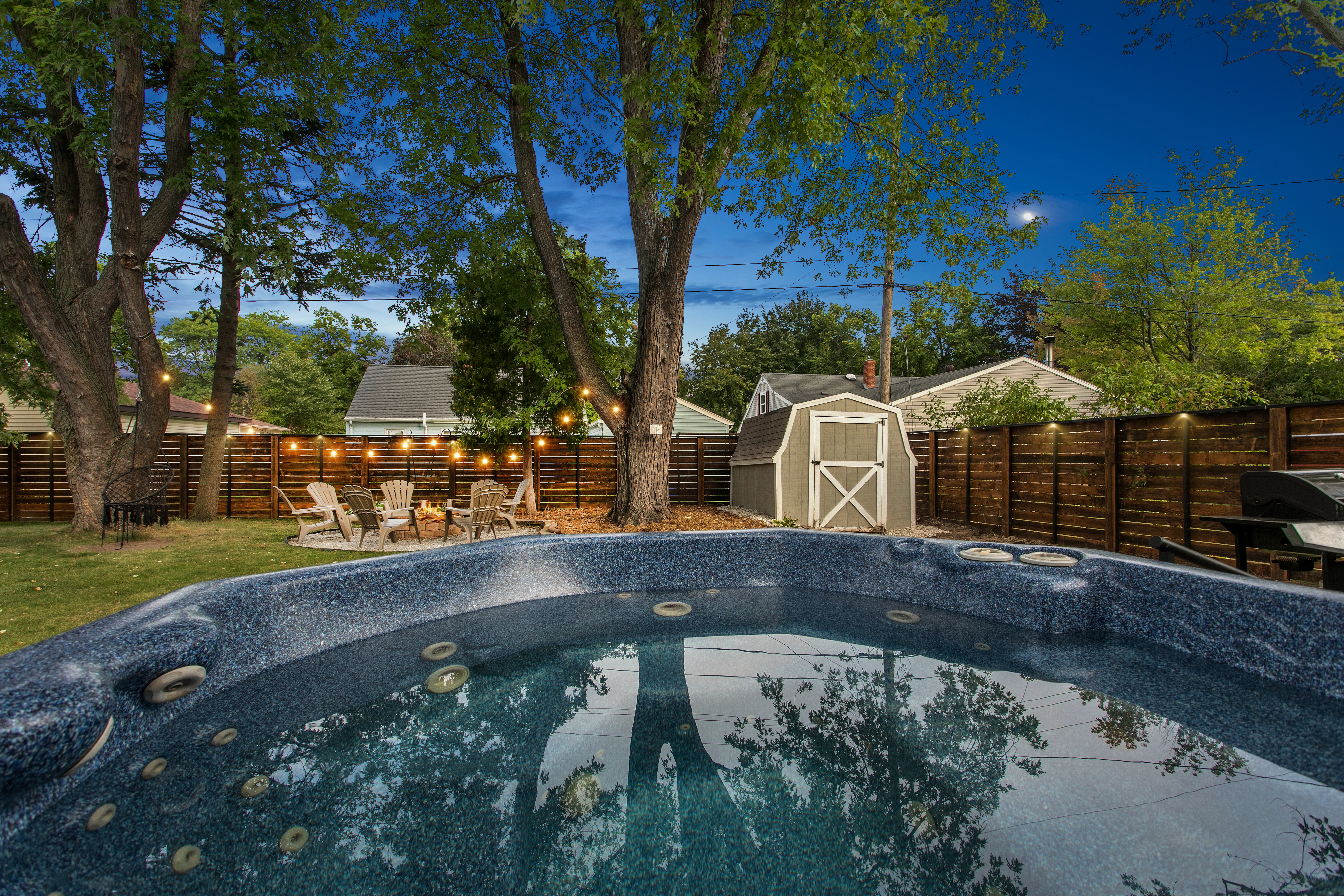Lombardi House backyard hot tub at dusk