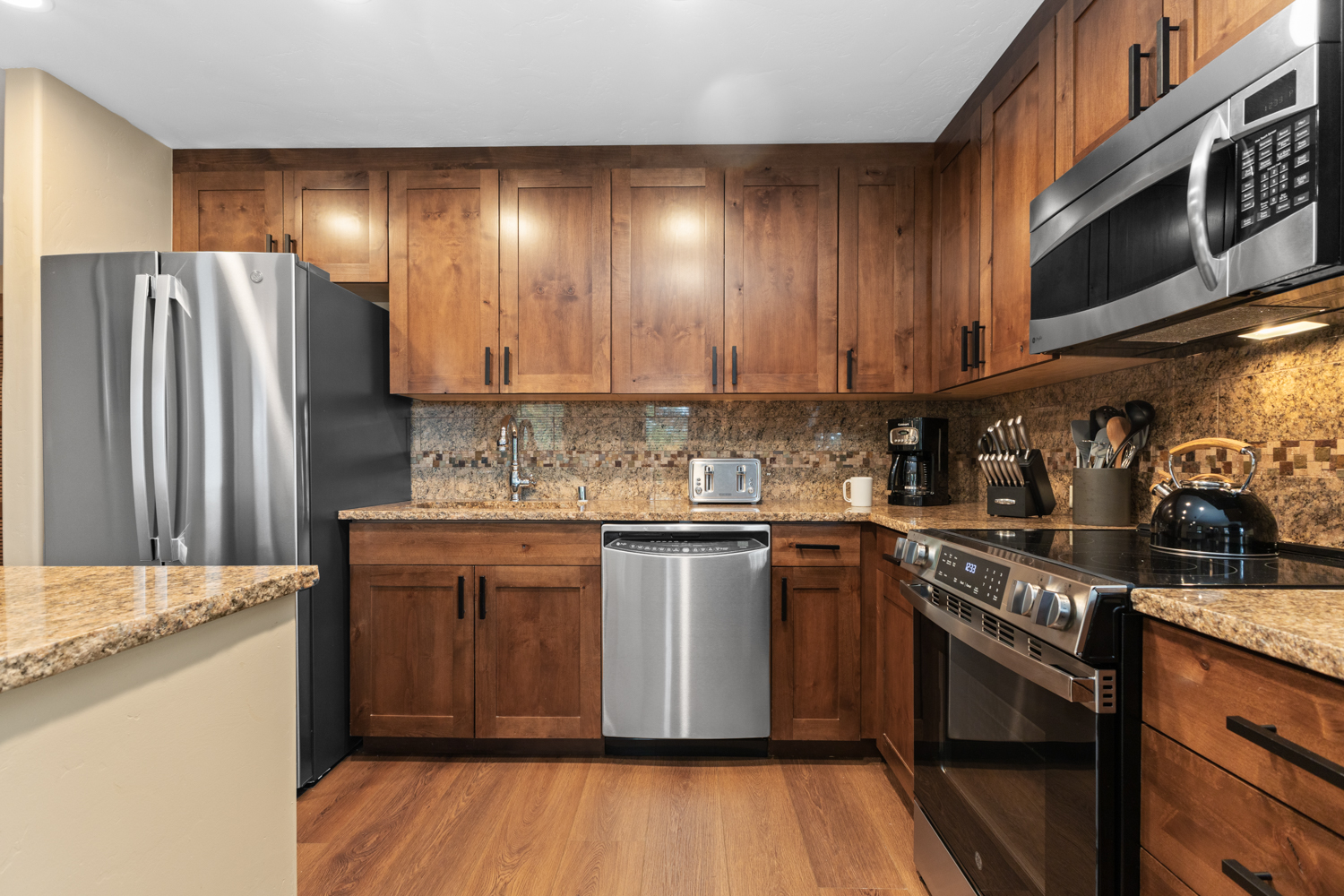 Kitchen with Refridgerator & Electric Stove