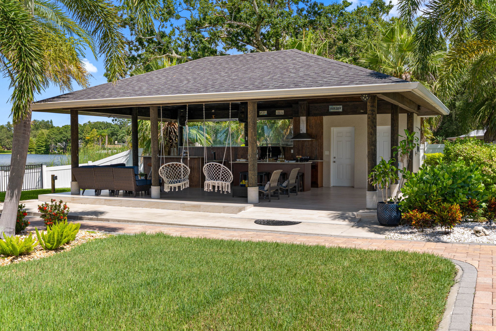 Step outside into your very own private lakeside retreat, where serene views and thoughtfully designed amenities come together to create the ultimate outdoor living experience.