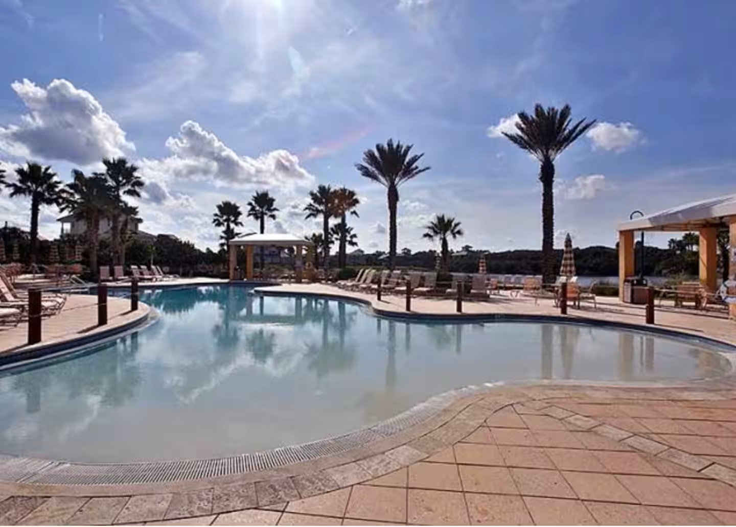 Relax poolside in true resort style 🌴
Spacious lounging areas, palm-lined views, and a serene setting make this Cinnamon Beach pool a favorite for soaking up the Florida sun.
