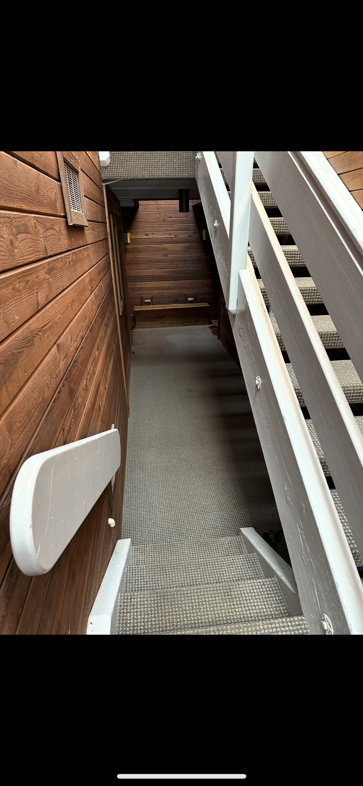 Stairs down to the first floor unit
