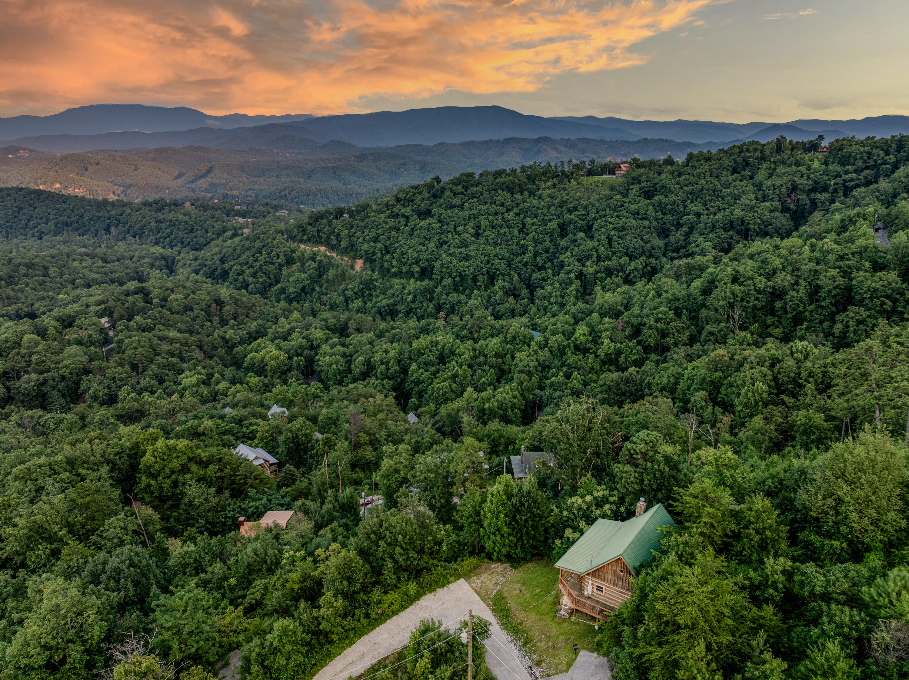 Tucked among the trees with sweeping mountain views all around