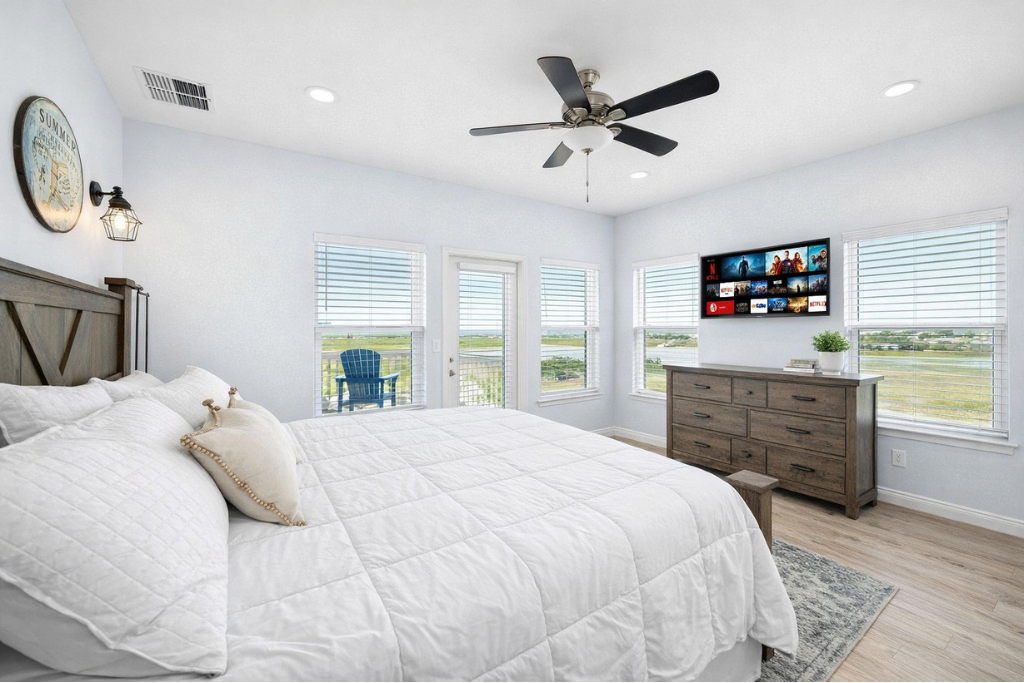 Upper Level King Suite (Alternate View): Wake up to coastal light in this private upstairs ensuite bedroom.