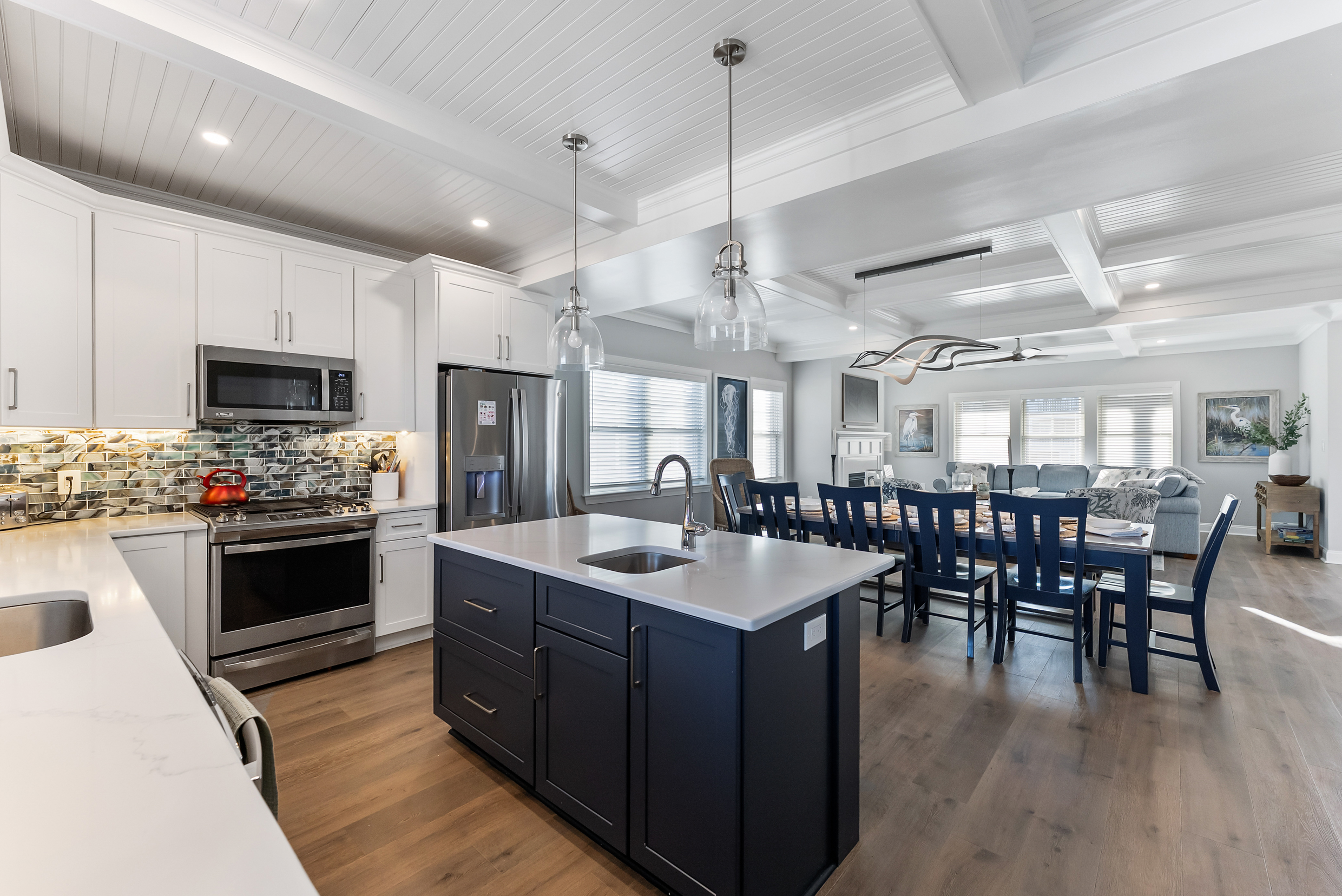 Large Kitchen With Island With View Of Large Dining Table