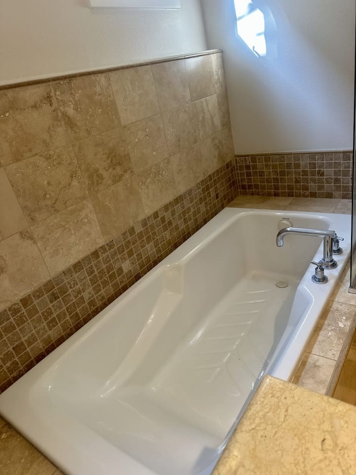 Over-sized soaking tub