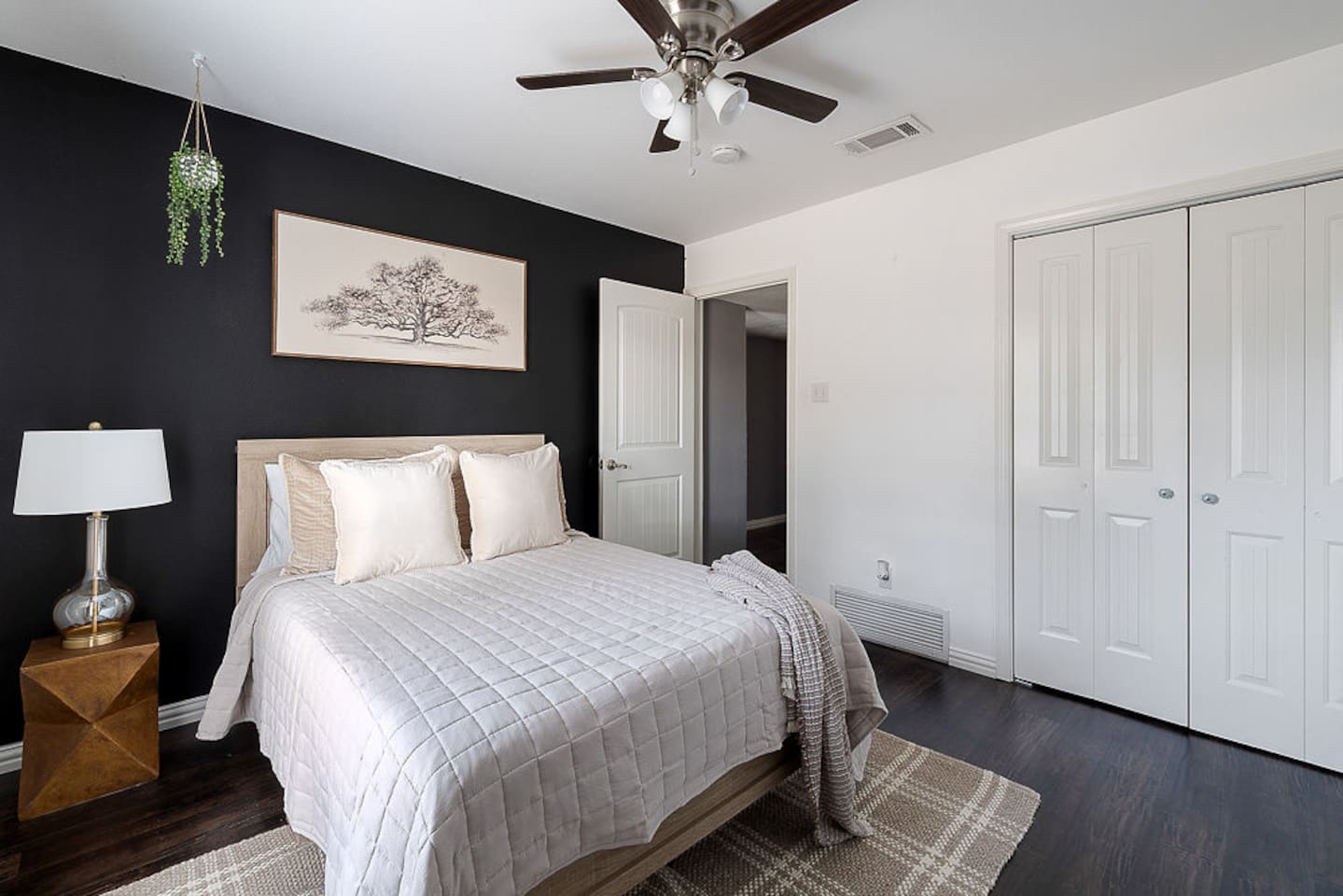 Enjoy this comfortable double bed, nightstand, lamp and closet with extra storage for your ultimate relaxation during your stay