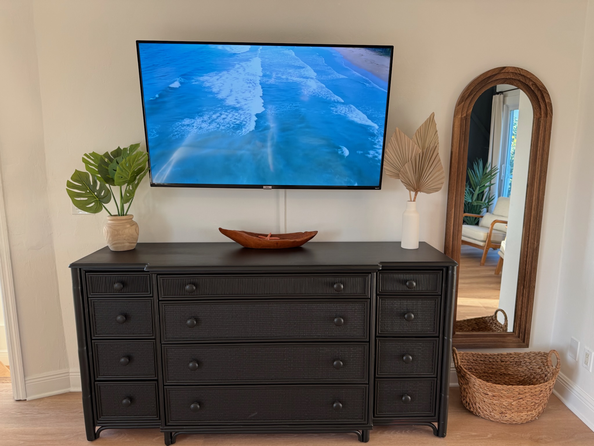 Upper floor primary bedroom with large smart TV
