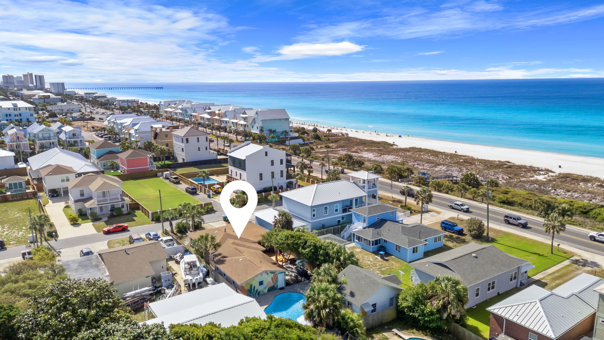 Gulf water and white sand are clearly visible from this aerial. Your
Salt & Sway escape is mapped right at the edge of it all.