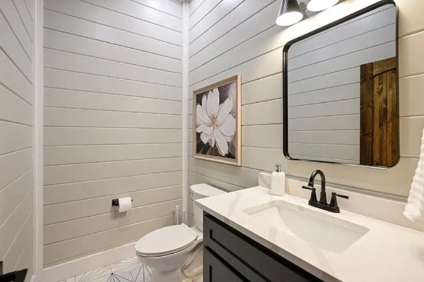 Minimalist bathroom design with modern vanity and clean finishes.