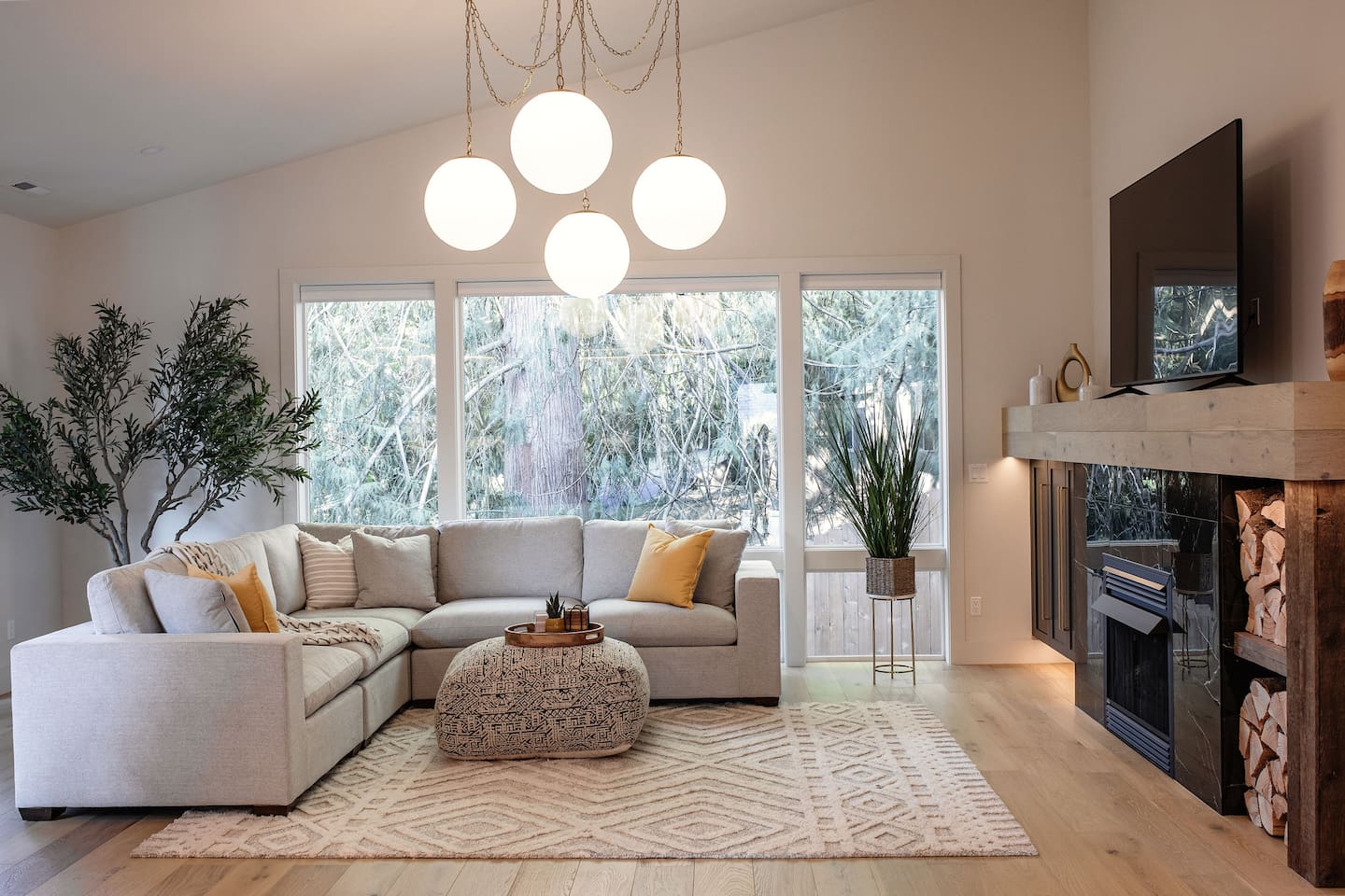 This is the living room area, featuring a 75-inch smart TV.