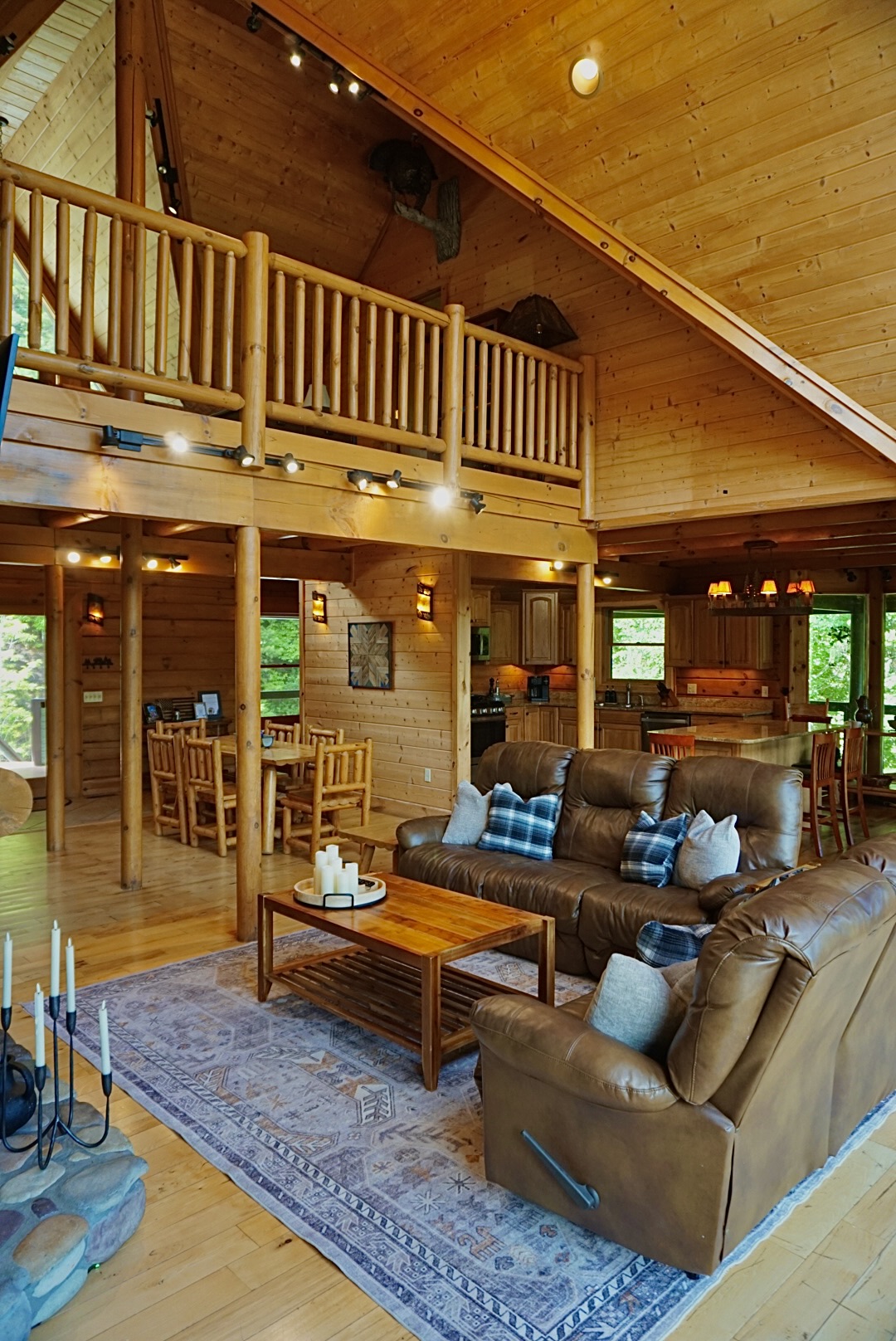 Living Room: Sunlit space with rustic charm, perfect for relaxation and laughter with friends and family!