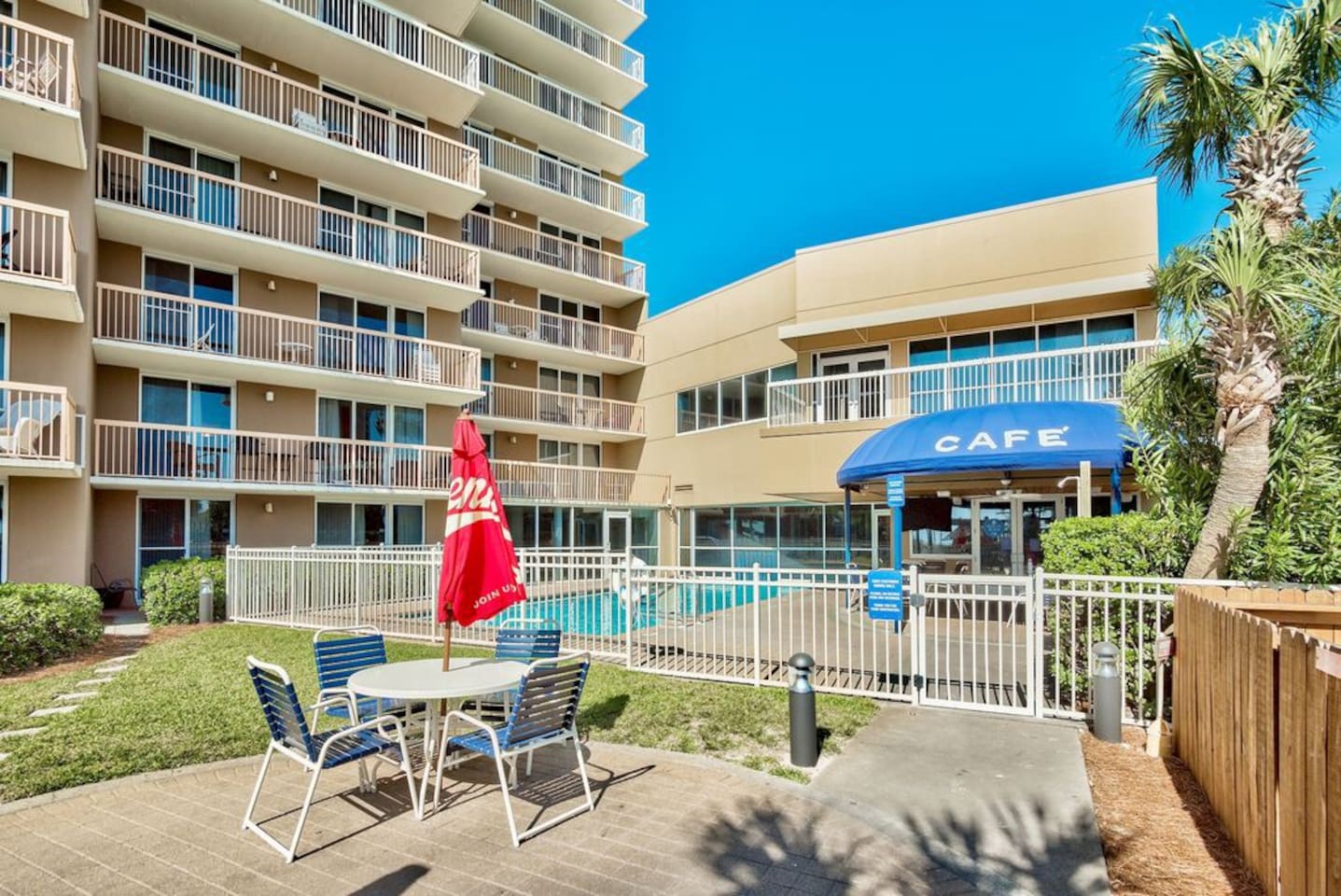 Outdoor dining area with easy access to Pelican Cafe for burgers and pizzas...