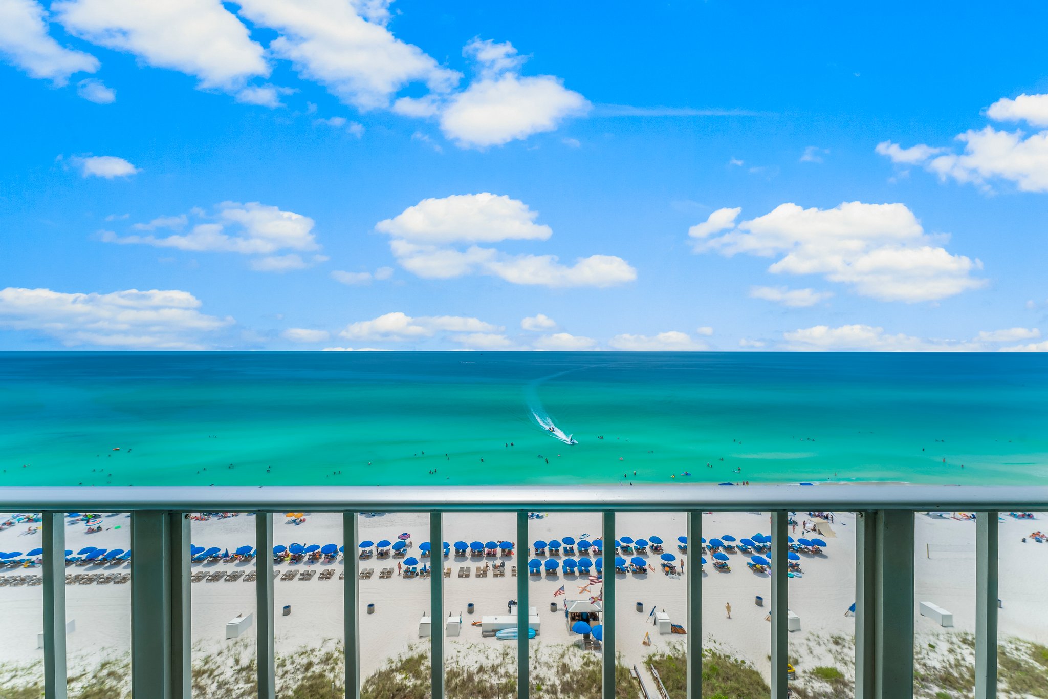Sip, savor, and surrender to bliss as you unwind with a glass of wine amidst the beauty of our 180-degree view of the emerald coast's teal-green waters. Let the gentle ocean breeze and the tranquil sound of waves mesmerize you as hues of the horizon evolv