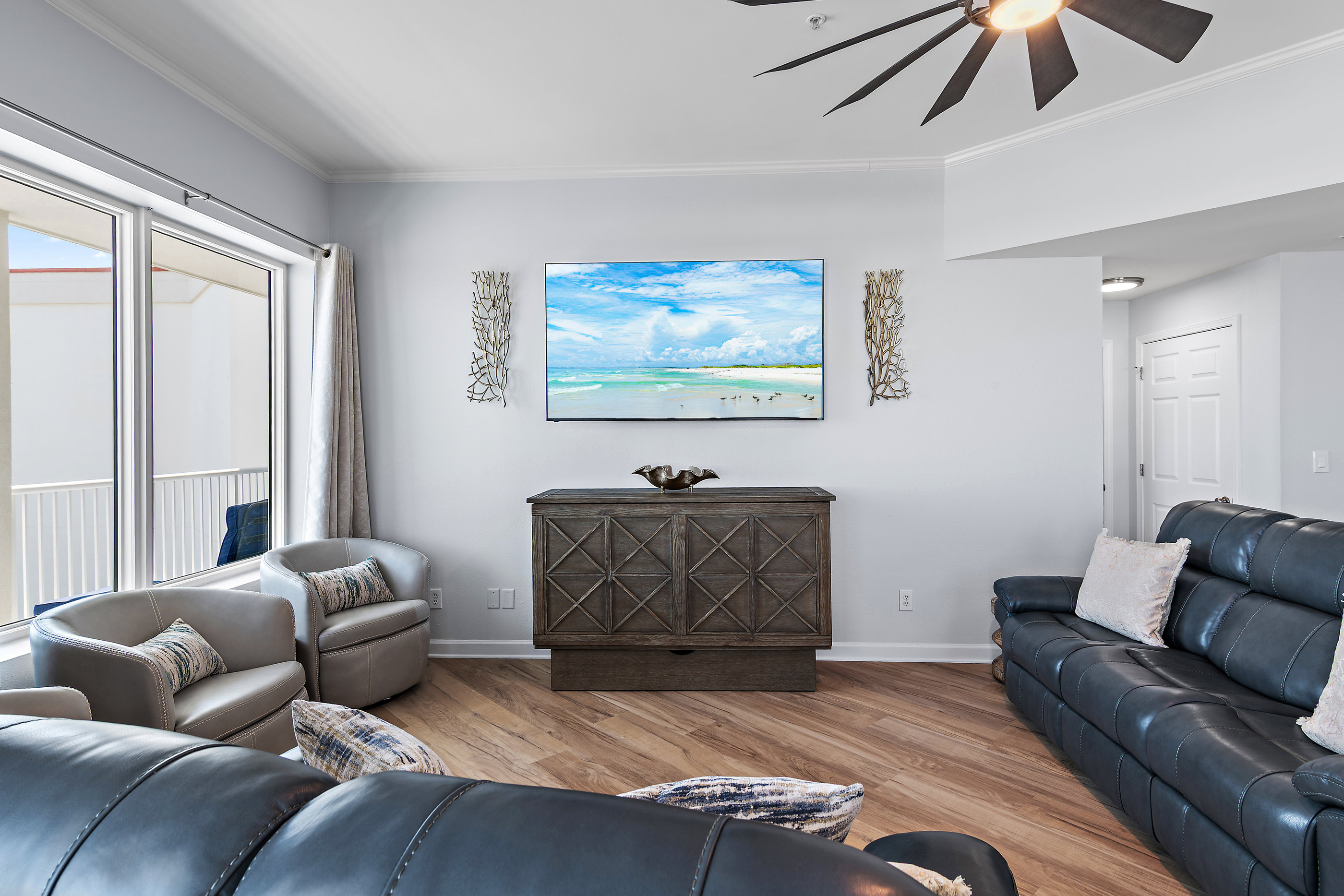 Living room with plush seating and Smart TV