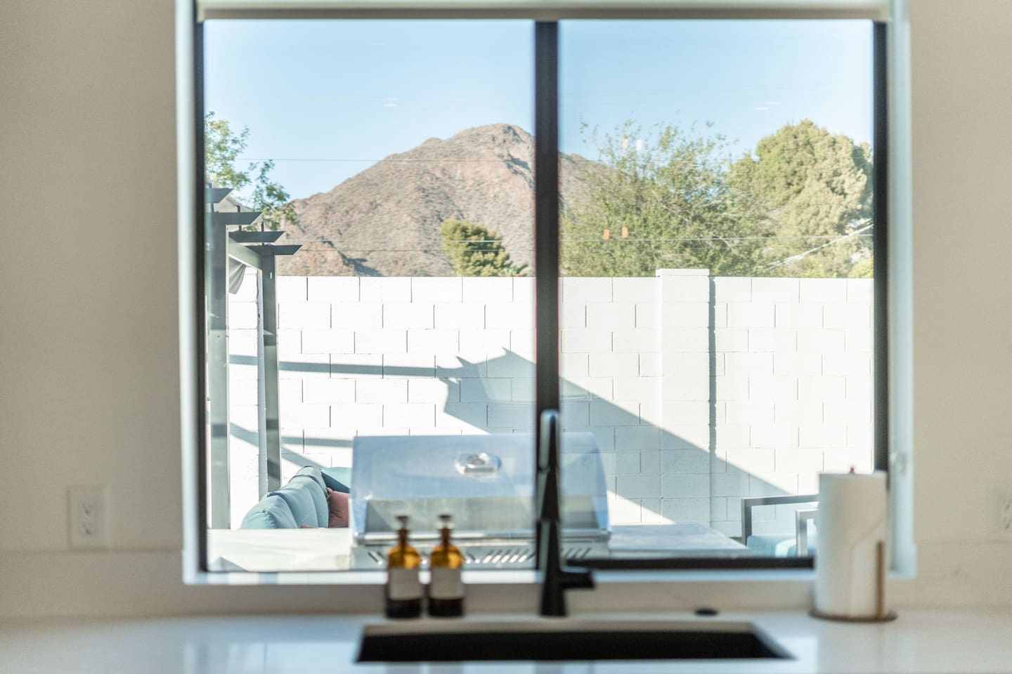 Enjoy cooking with breathtaking mountain views right from the kitchen window, blending modern design with nature’s beauty