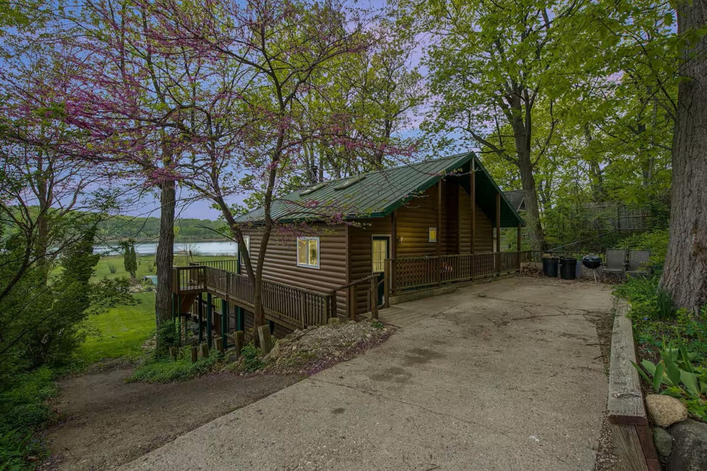 Front view of the rustic Cabin. Secluded charm with private parking area. More parking across the road as well.