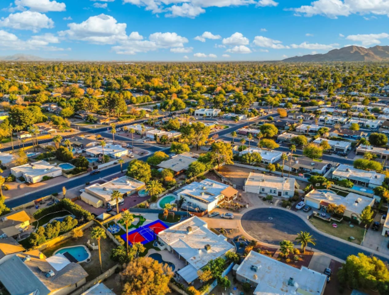 Set in a quiet, established Scottsdale neighborhood, with the property's own color-block court giving it away from the sky.
