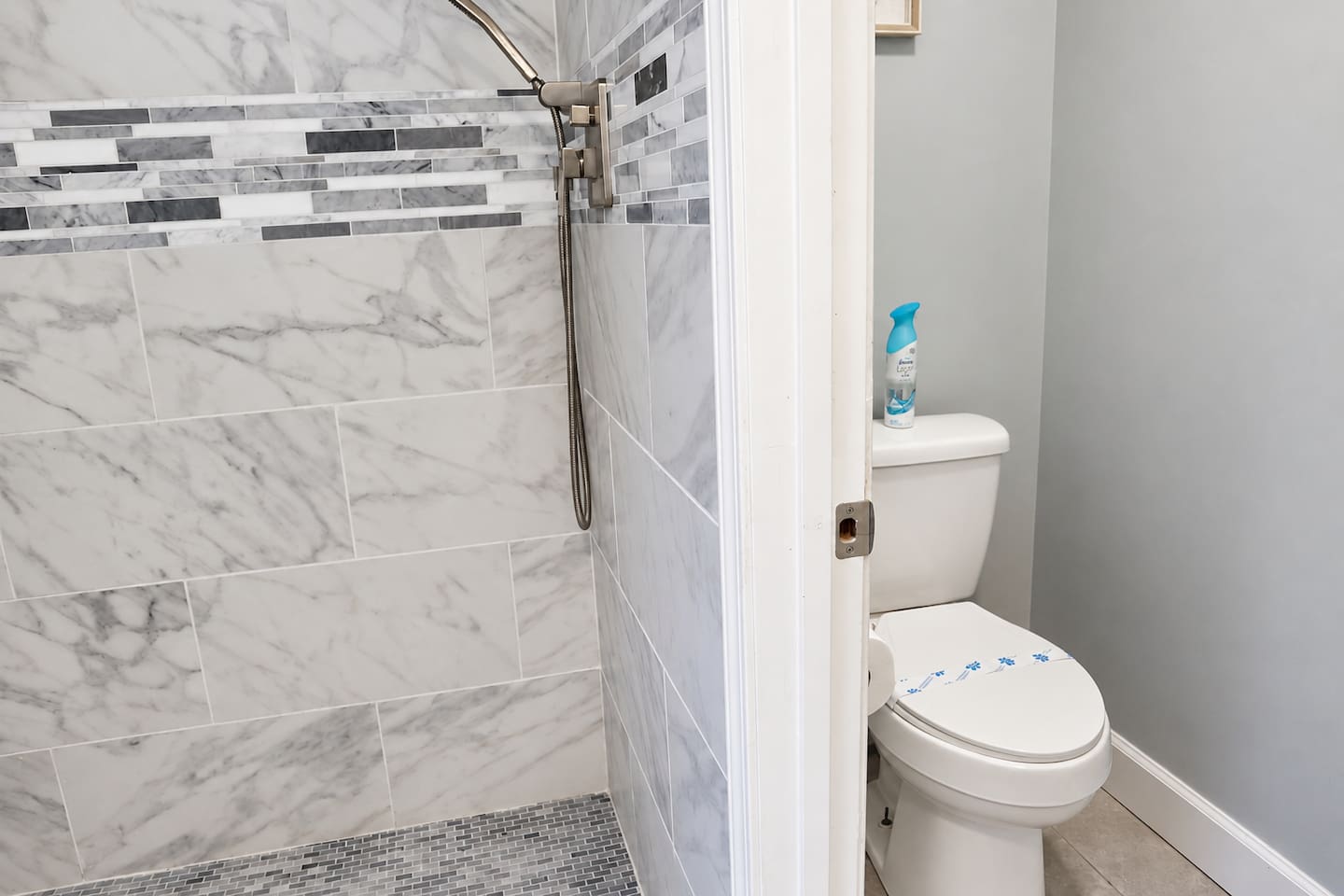 Bathroom Retreat: Elegant marble accents and modern fixtures make this your perfect getaway refresh!