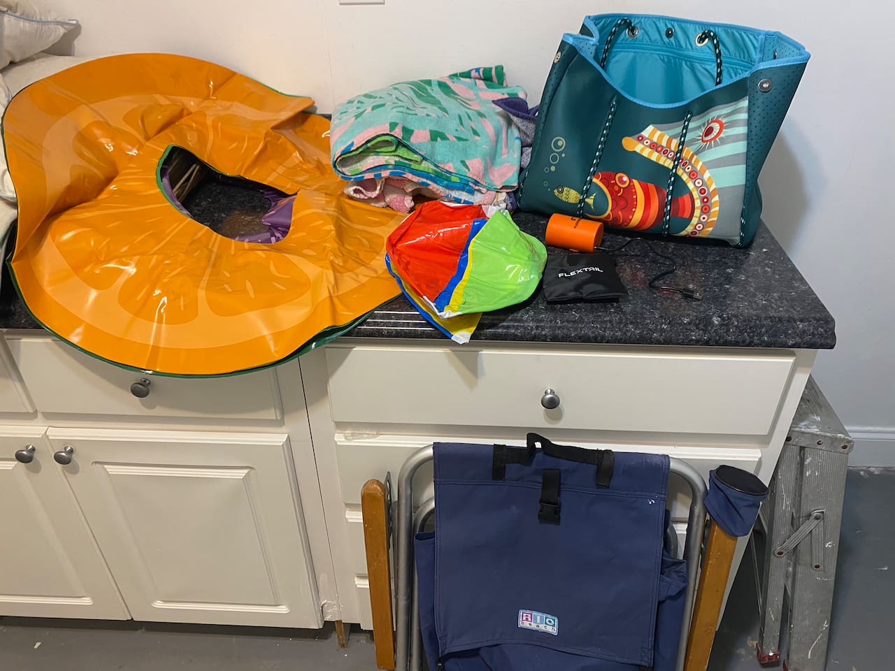Beach bag, beach chairs, floaties, beach ball and rechargeable inflater 