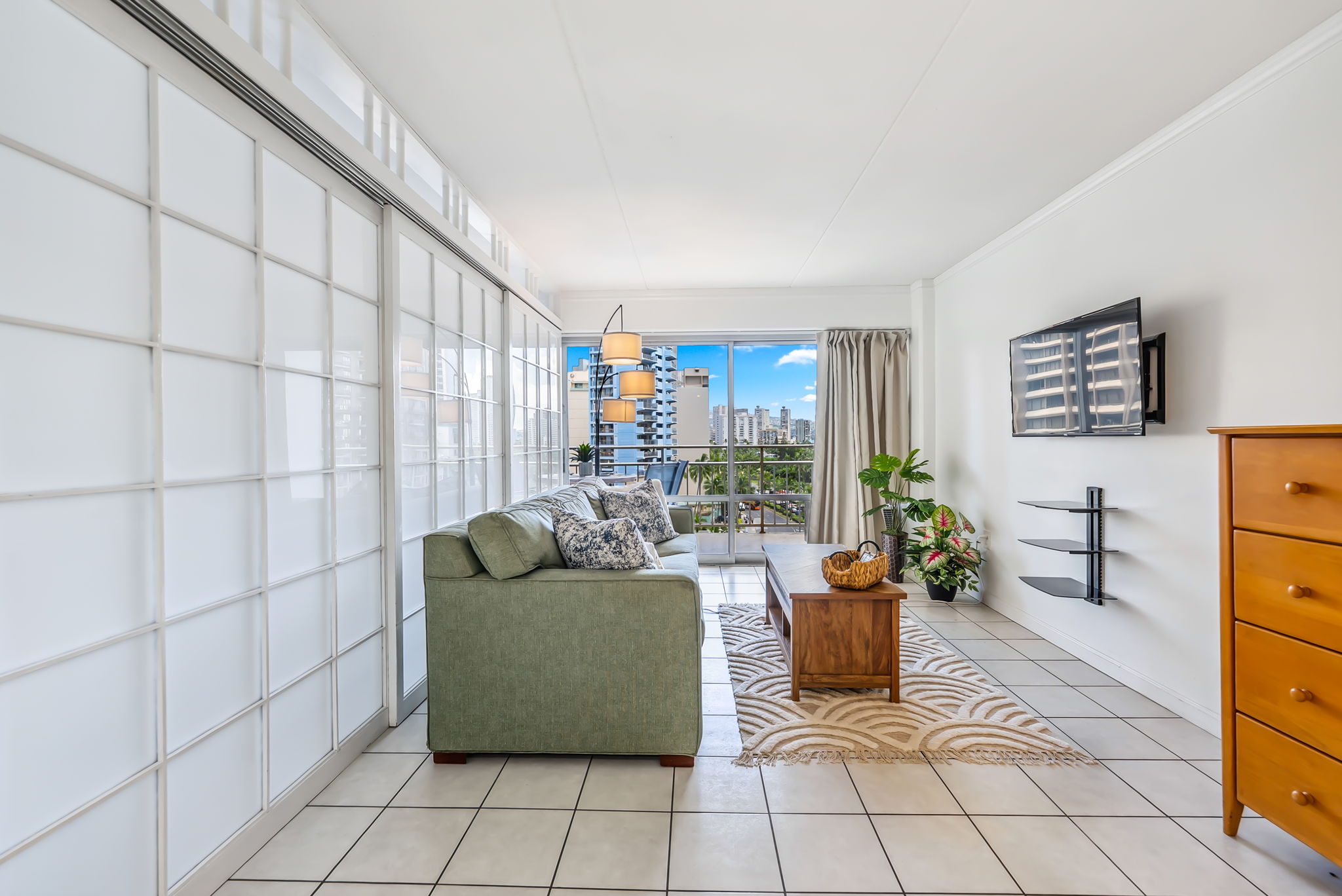 Walk in view of the suite showing shoji sliding doors utilized to separate living area from bedroom for added privacy