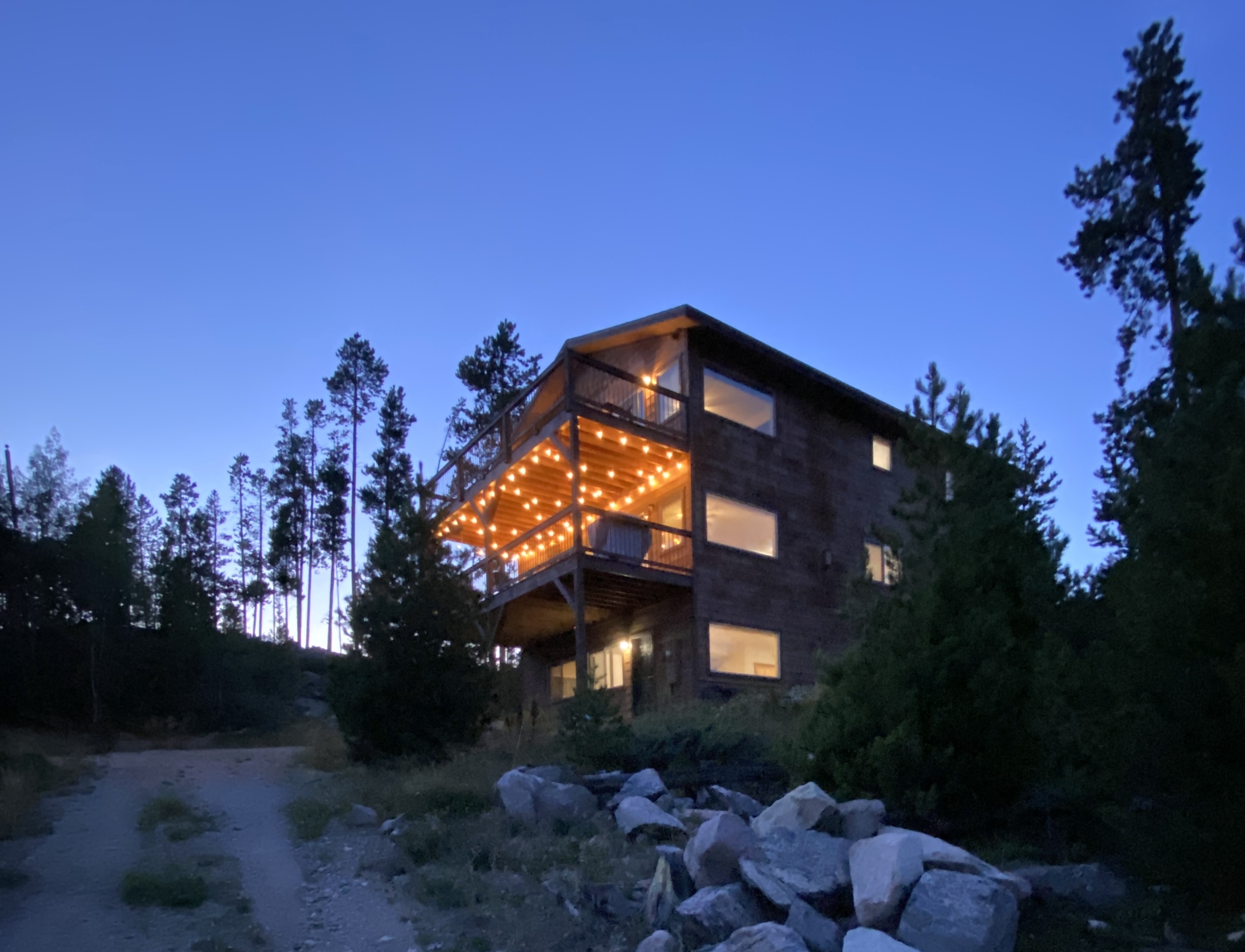 Experience unparalleled serenity in this stunning three-story mountain retreat, beautifully crafted with expansive decks to enjoy the views.
