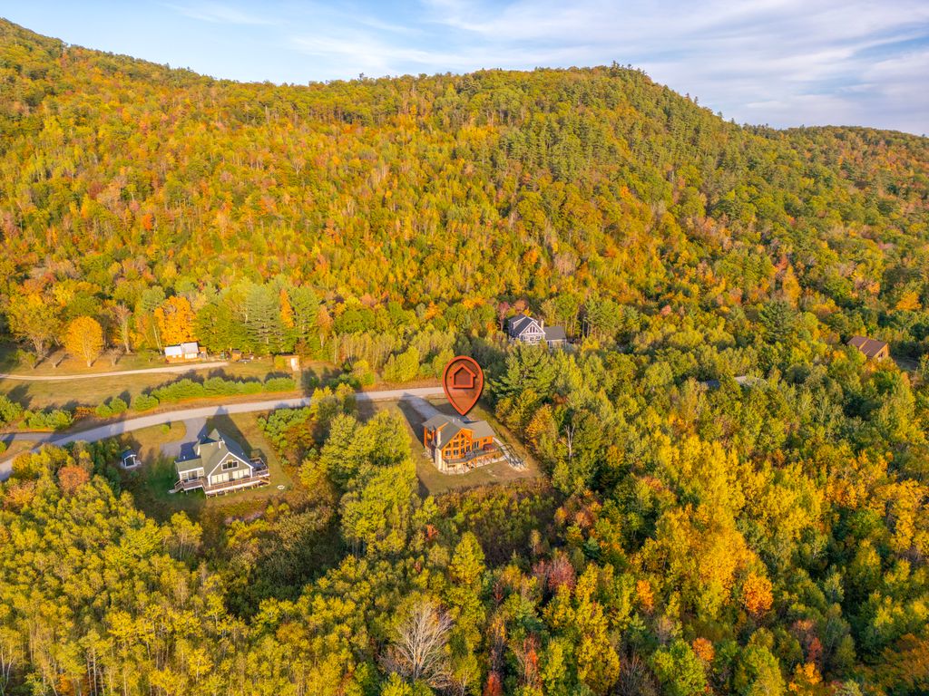 Stunning aerial view capturing the home and its natural surroundings.