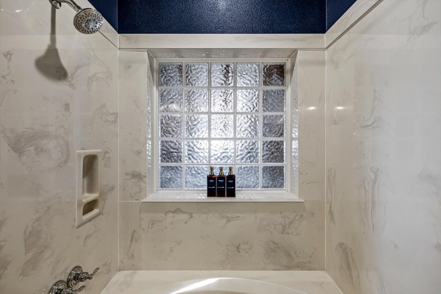 Extra large tub shower combination is versatile for all needs.
