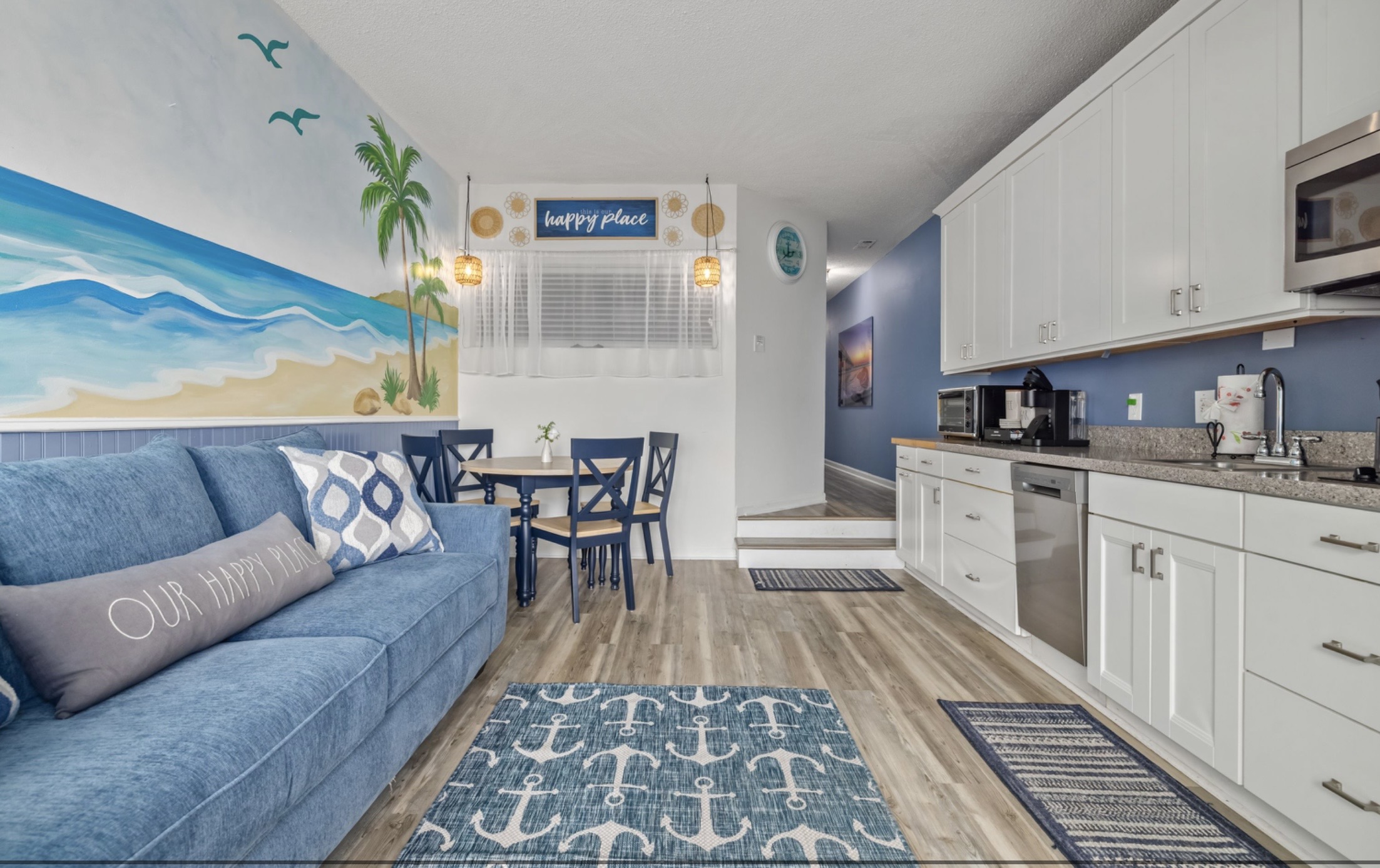 Open-concept living, dining, and kitchen designed for connection, relaxation, and easy vacation living.